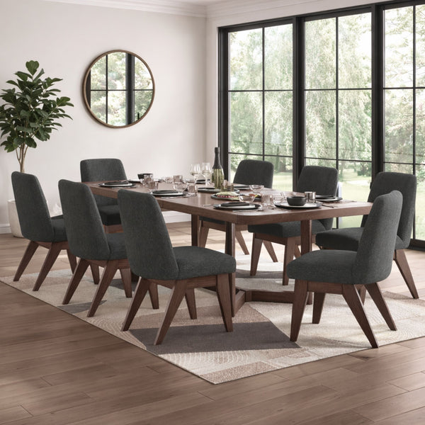 Brown Dilenno EXT dining room table set by Signature Ashley with matching chairs, perfect for family meals and gatherings.