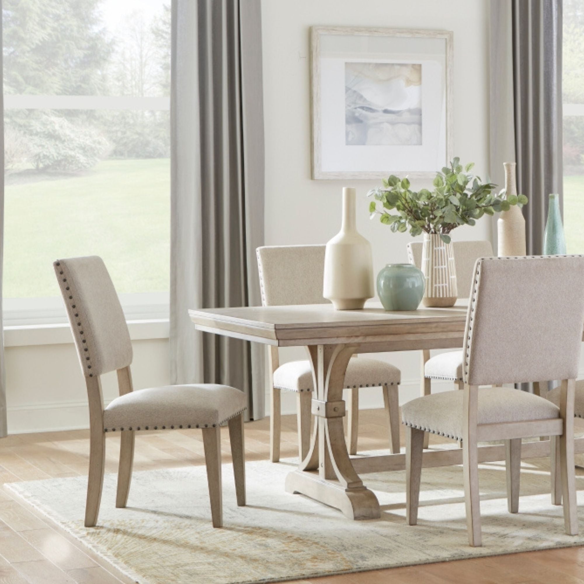 MAZ Fallon Collection dining room table set with wooden table and matching chairs in a modern dining area.