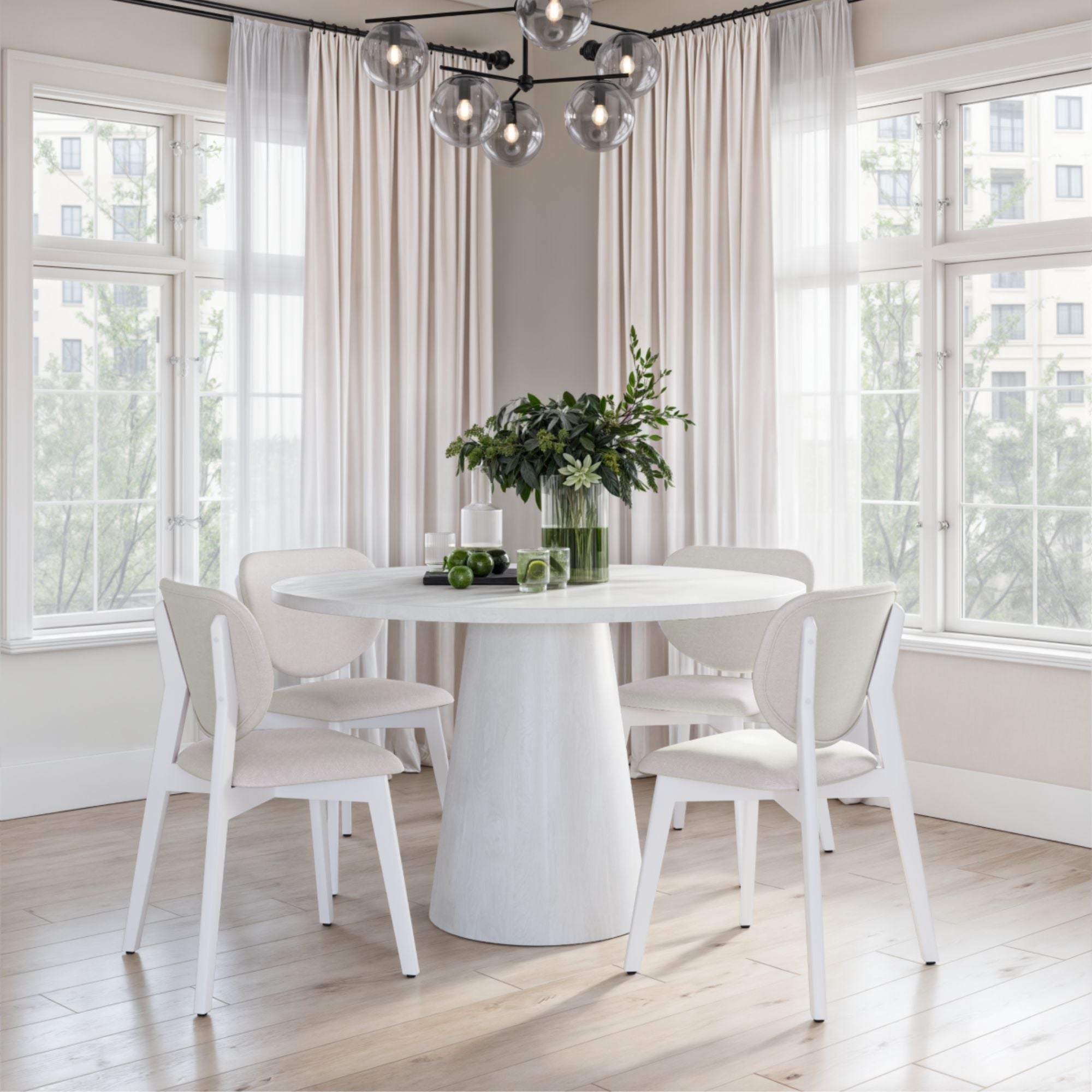 Set of two Durana dining chairs by Brassex with wooden legs and upholstered seats, shown in a modern dining room setting.