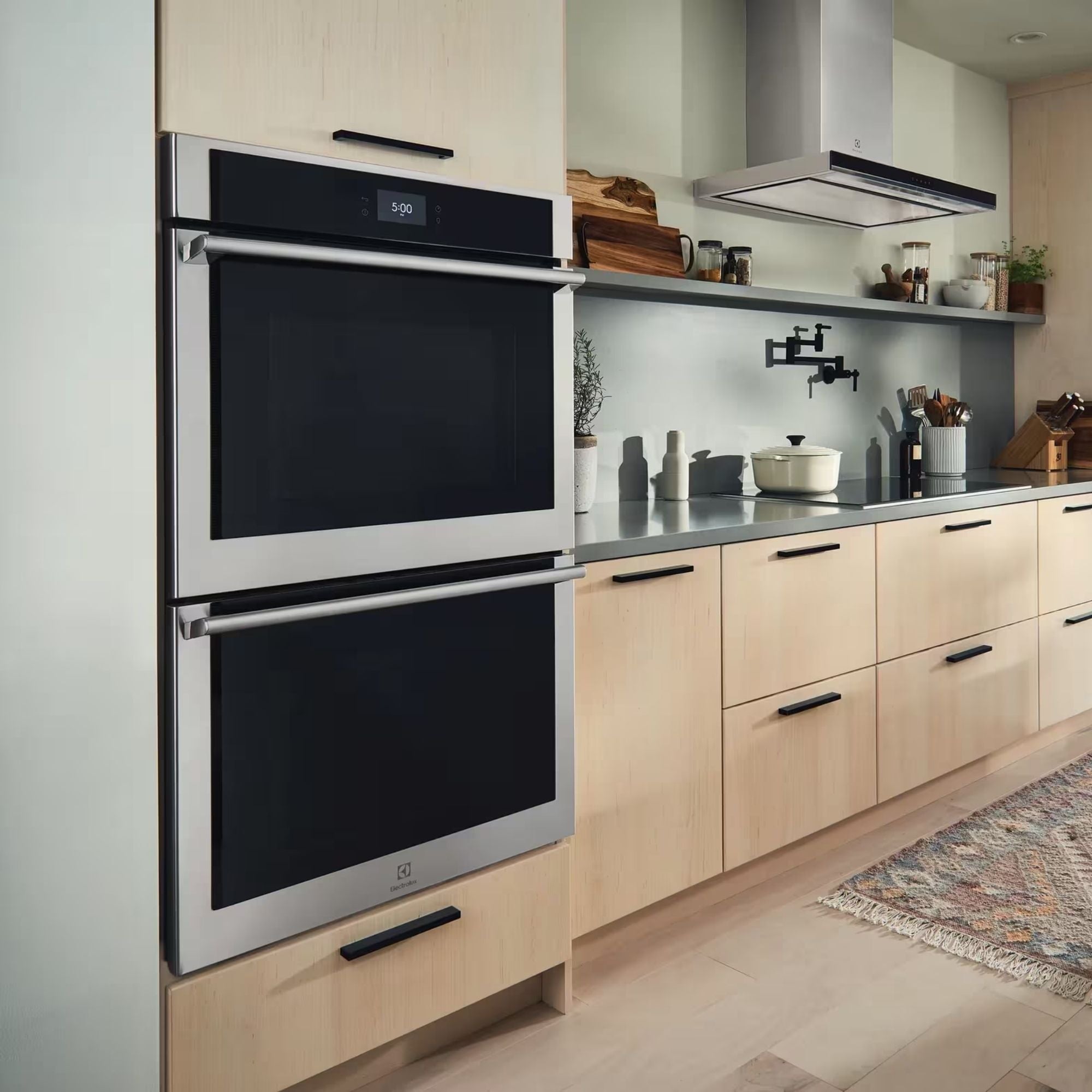 Electrolux ECWD3012AS 30-inch electric double wall oven with stainless steel finish and digital control panel.