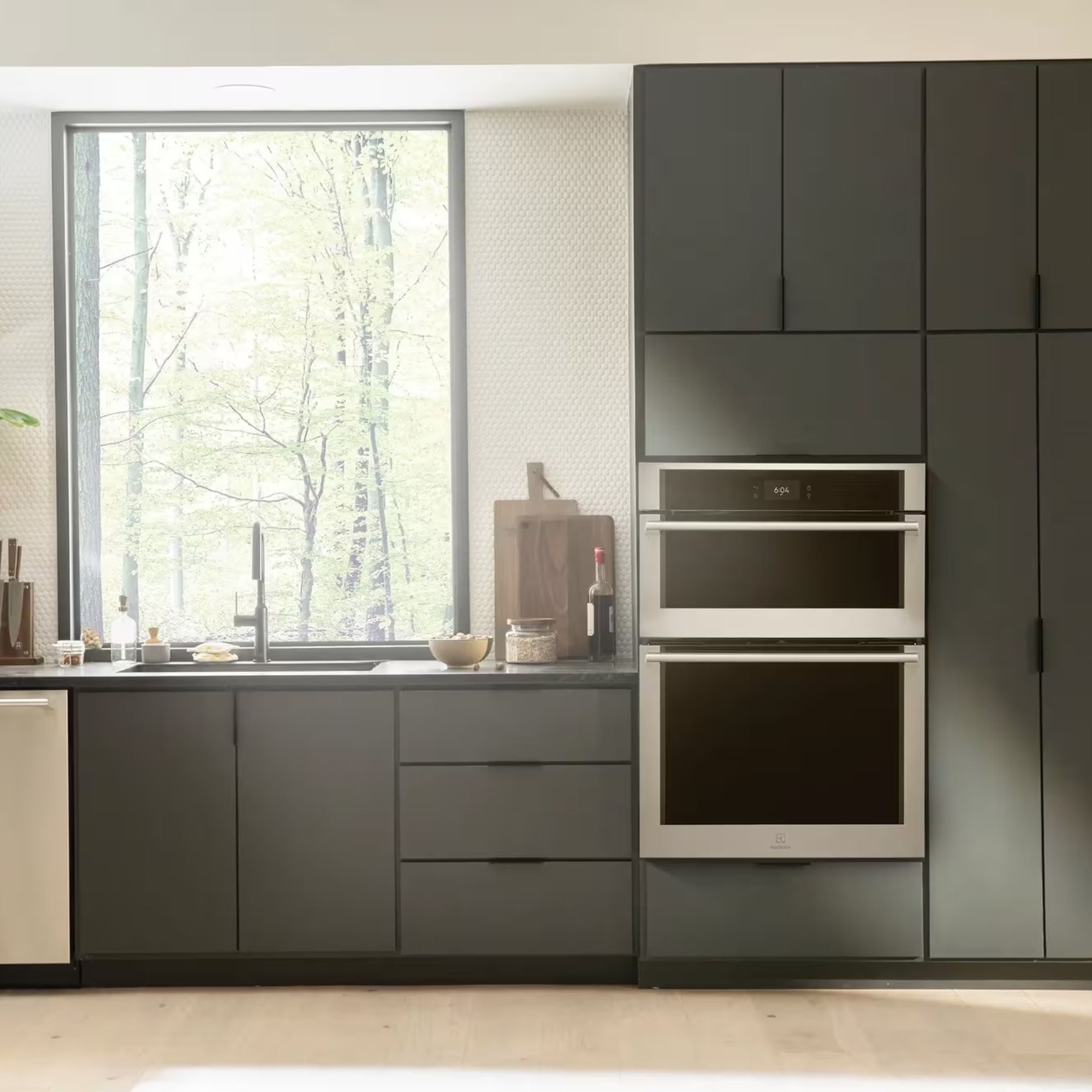 Electrolux 30-inch stainless steel wall oven and microwave combination, featuring digital controls and modern design.