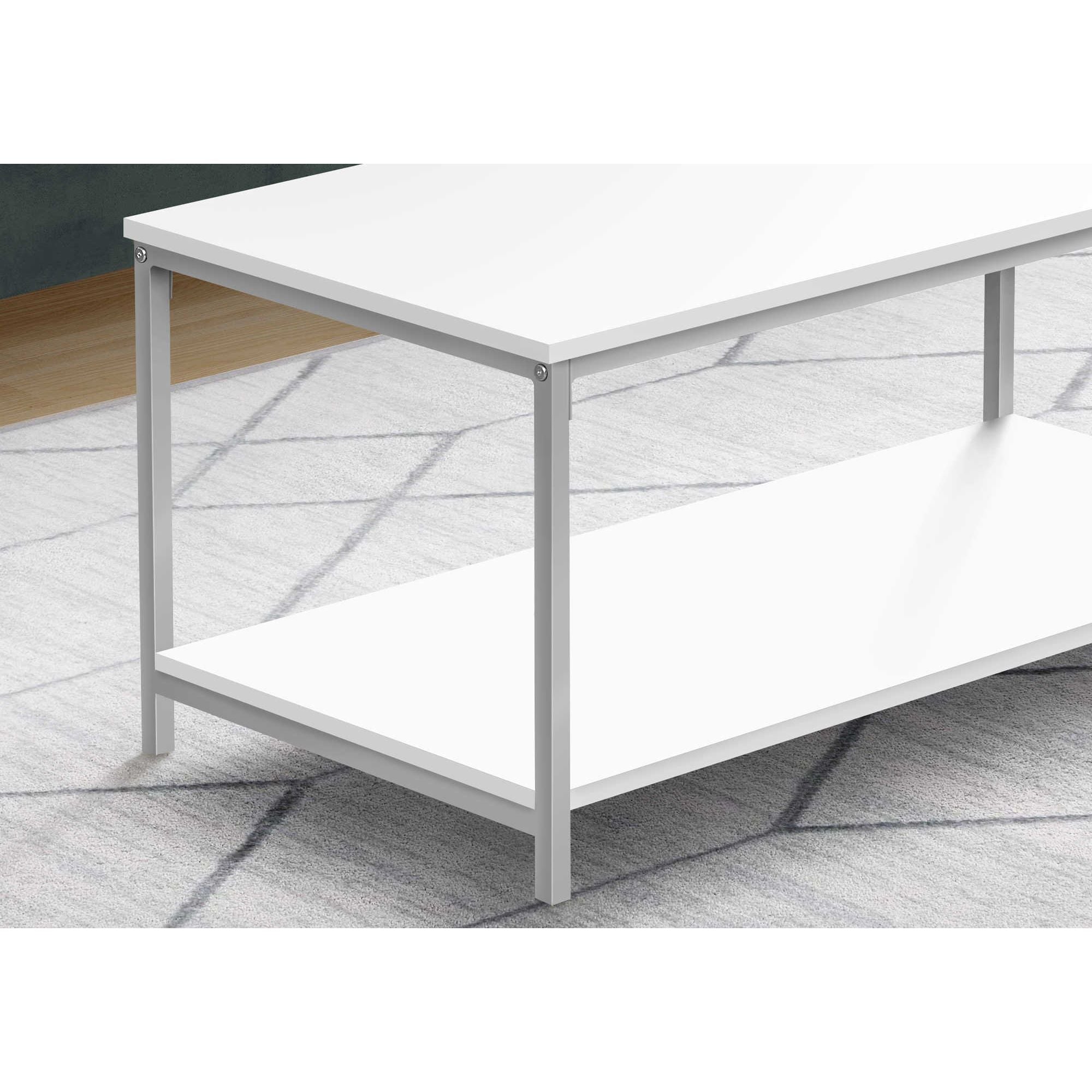 Elara coffee table by Monarch Specialties featuring a sleek modern design with a glass top and wooden legs.