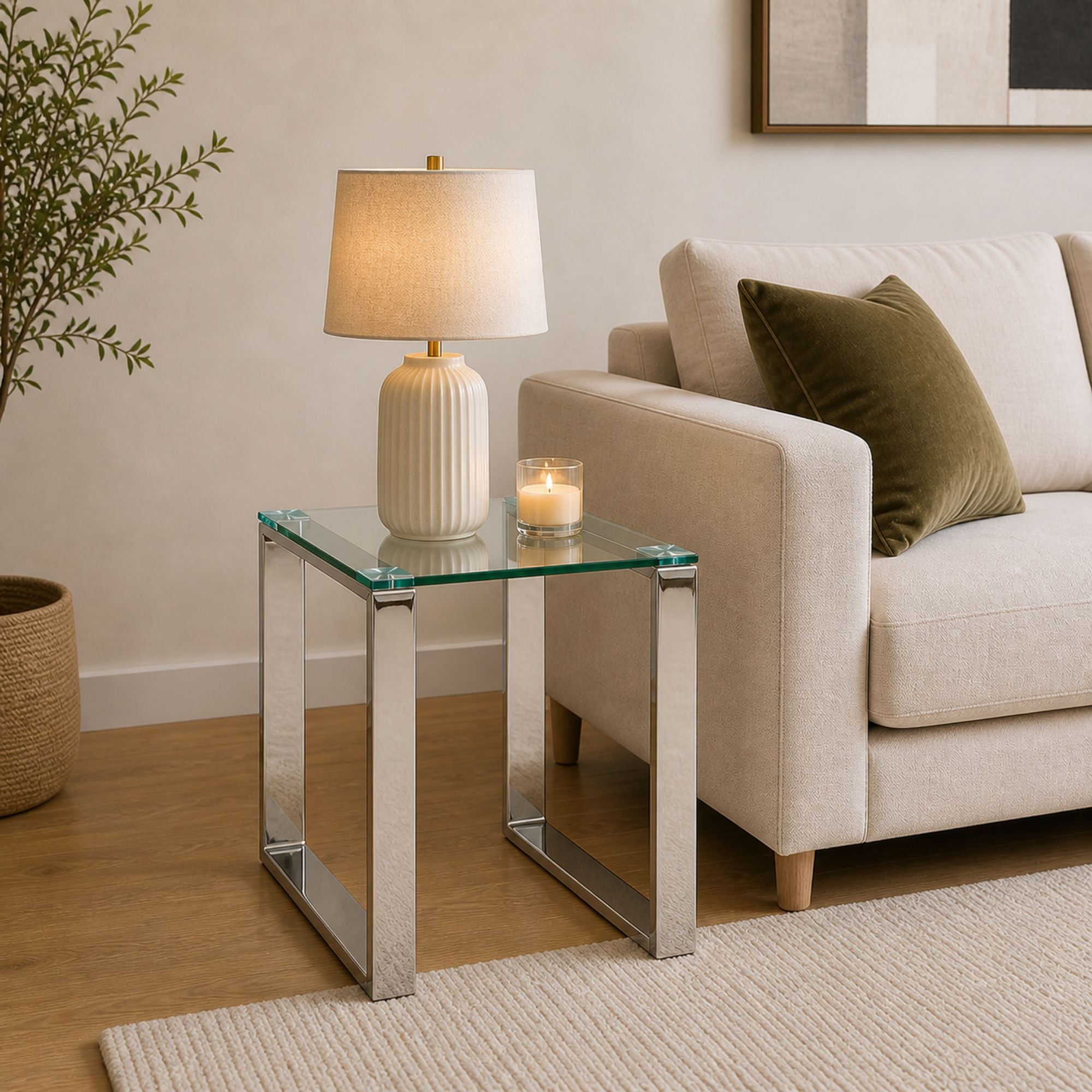Elite Living GEM glass end table with clear glass top and sleek metal frame, ideal for living room decor.