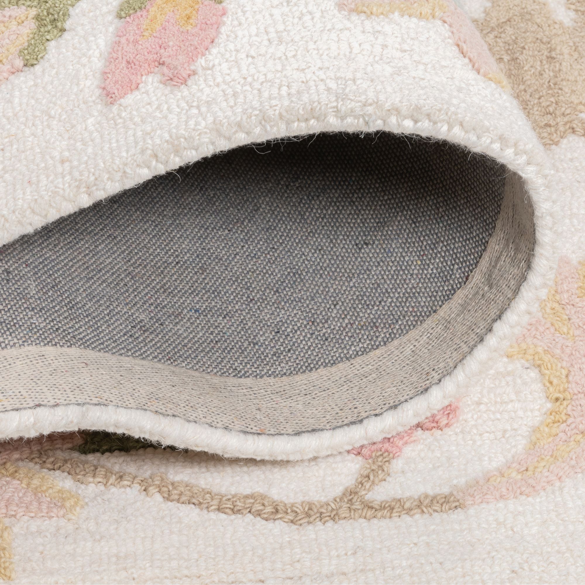 Viana Inc Frieda Soft Indoor Handmade Area Rug with intricate patterns in warm tones, ideal for cozy interior spaces