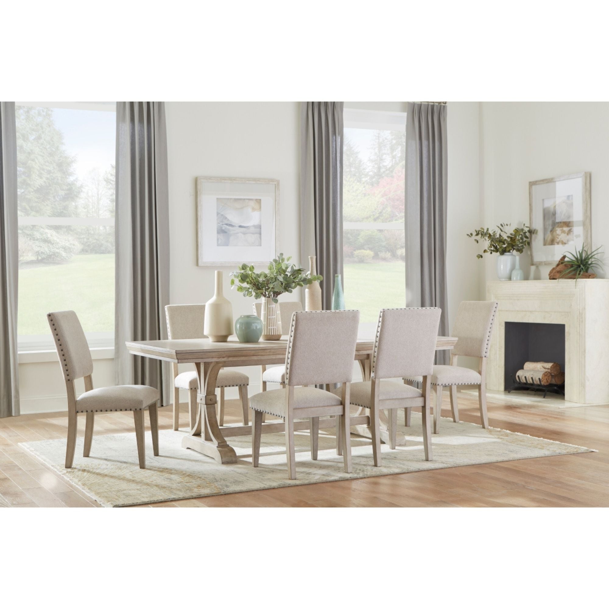 MAZ Fallon Collection light grey dining chair with sleek modern design and comfortable upholstered seat.