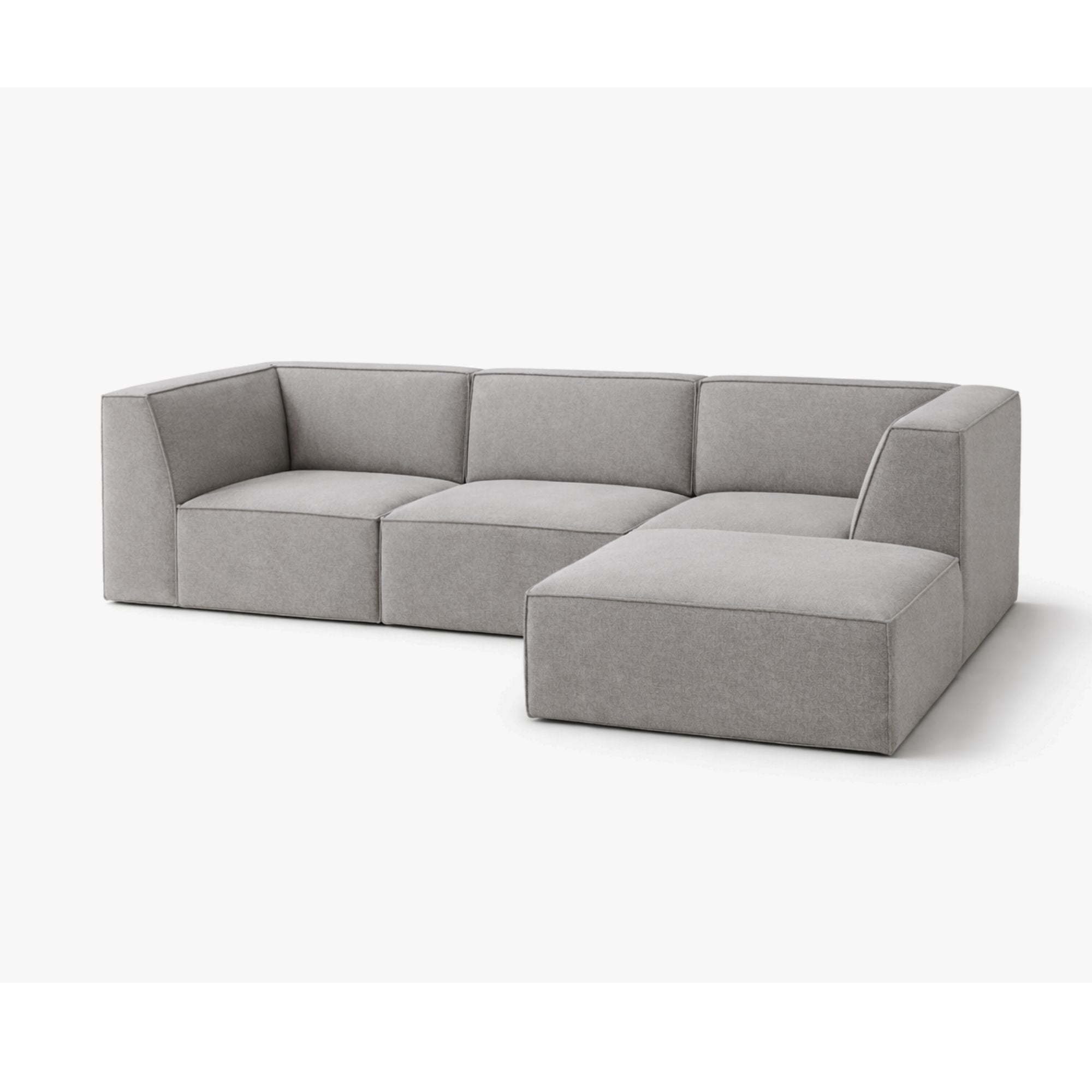 Steel grey flare sectional sofa from Statum Designs Inc, showcasing plush cushions and modern design in a stylish living room setting.