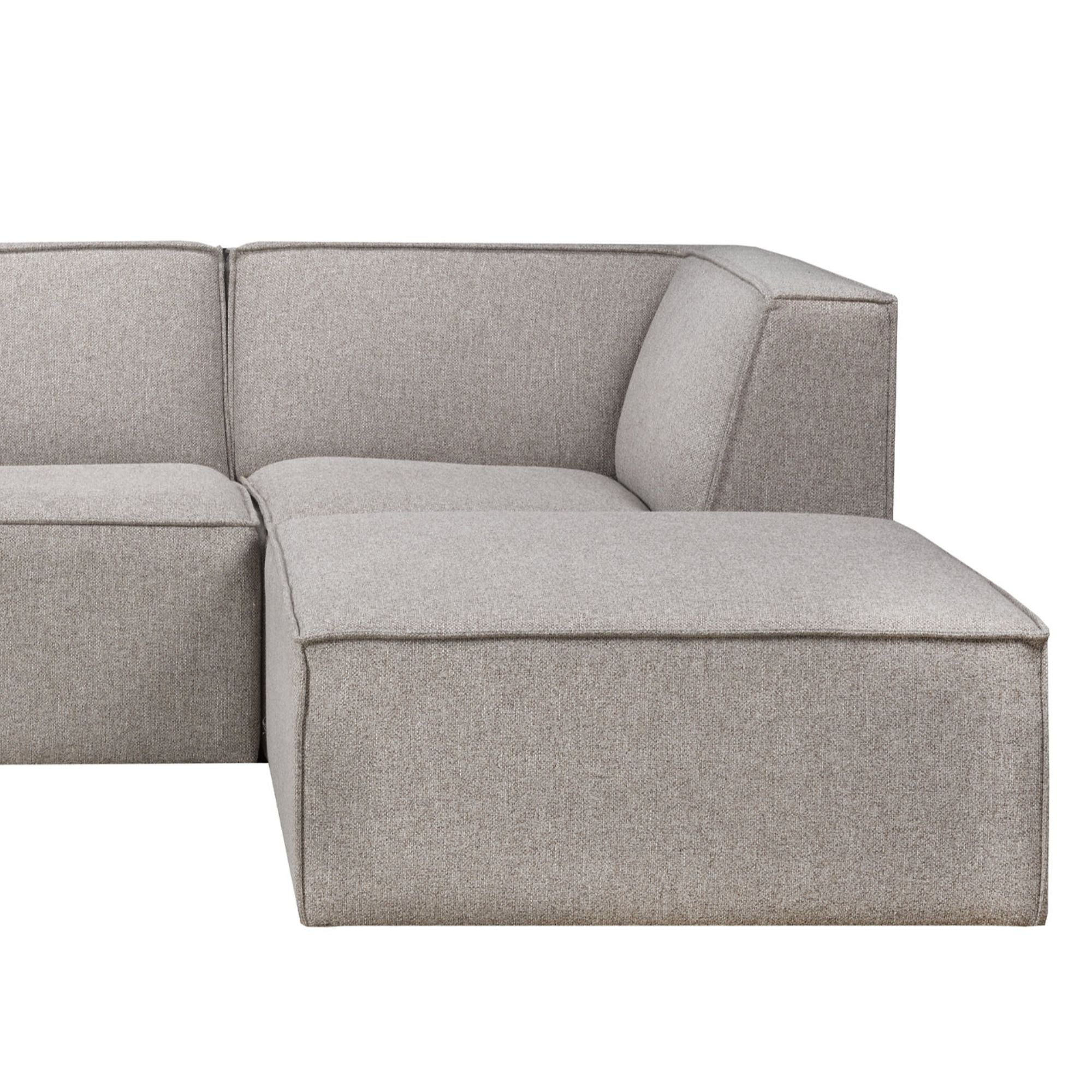 Steel grey flare sectional sofa from Statum Designs Inc's Designers Collection with plush cushions and modern design.