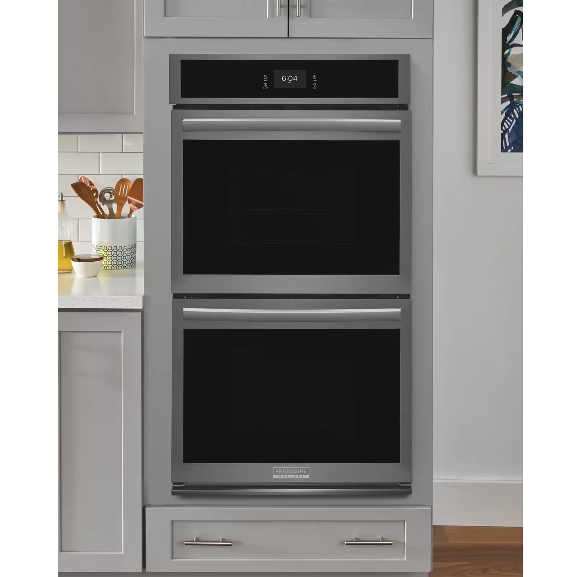 Frigidaire Gallery 27-inch double electric wall oven with black stainless steel finish and total convection cooking system.