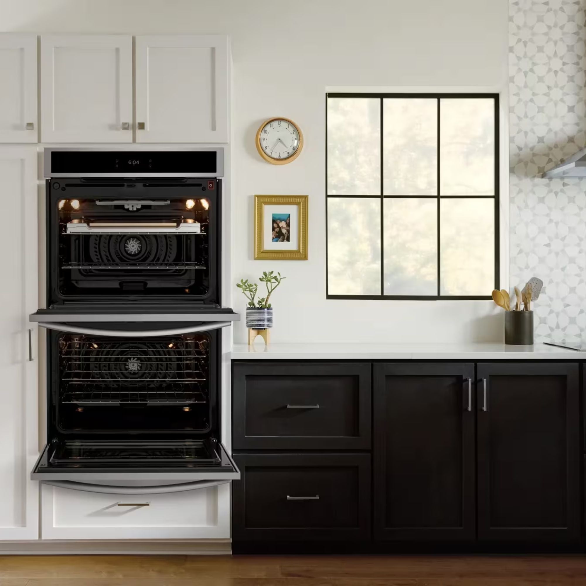 Frigidaire Gallery 30-inch double electric wall oven with stainless steel finish and stone-baked pizza feature.