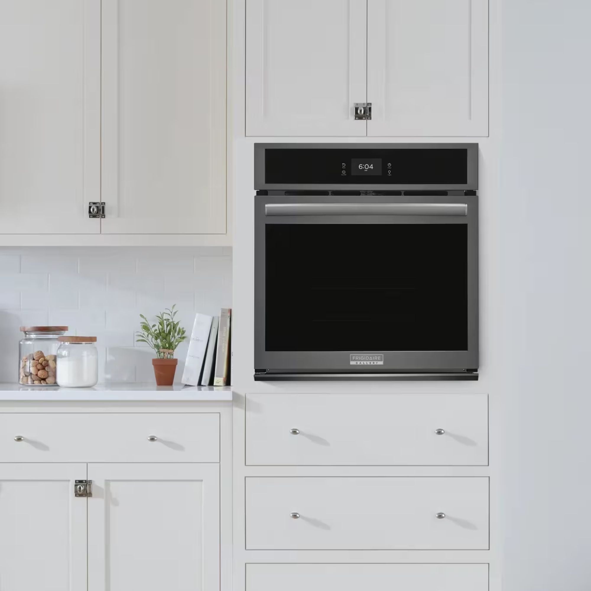 Frigidaire Gallery 27-inch single electric wall oven with black stainless steel finish and total convection cooking.