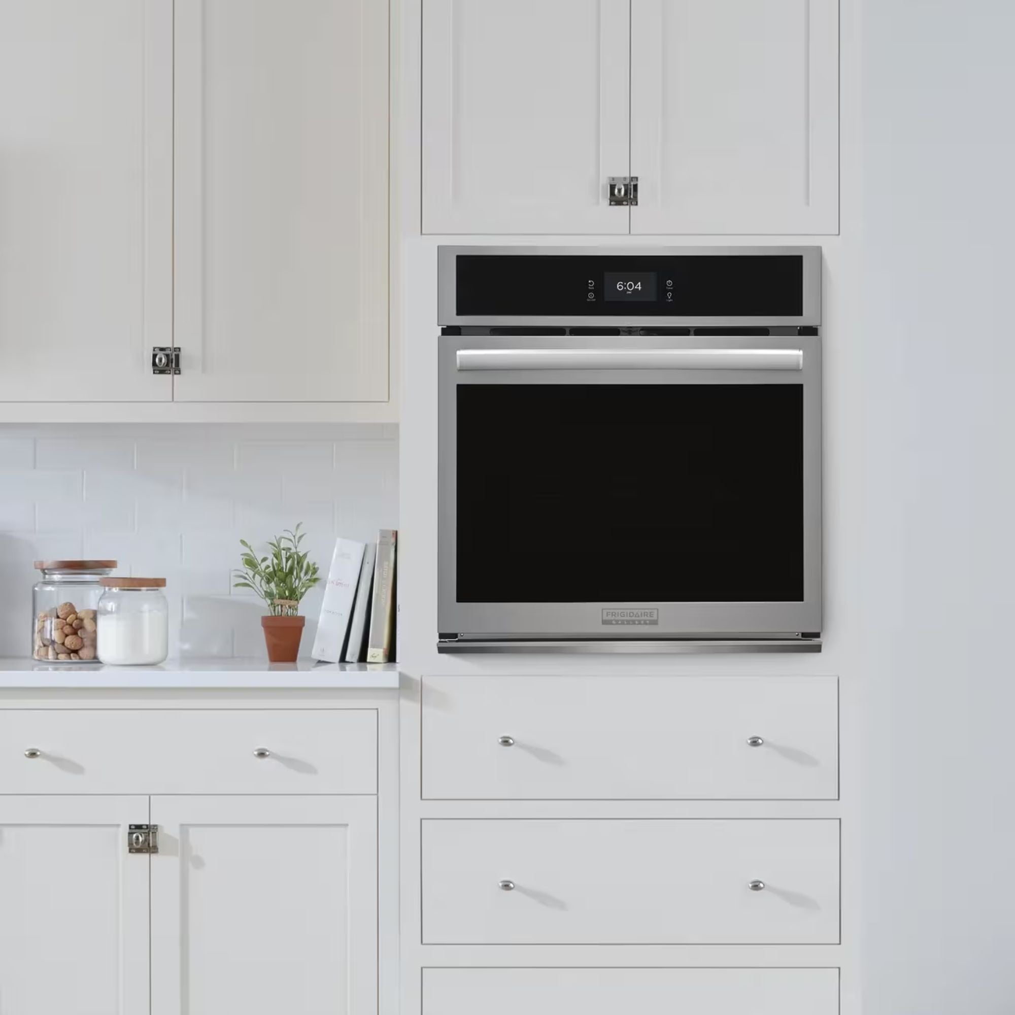 Frigidaire Gallery 27-inch stainless steel single electric wall oven with total convection baking, modern kitchen appliance.