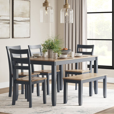 Ashley Gesthaven 6-piece dining room table set with natural wood finish and blue upholstered chairs, ideal for casual dining spaces.