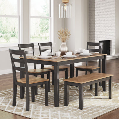 Six-piece Ashley Gesthaven dining room table set in natural and brown wood finish, including table and matching chairs.