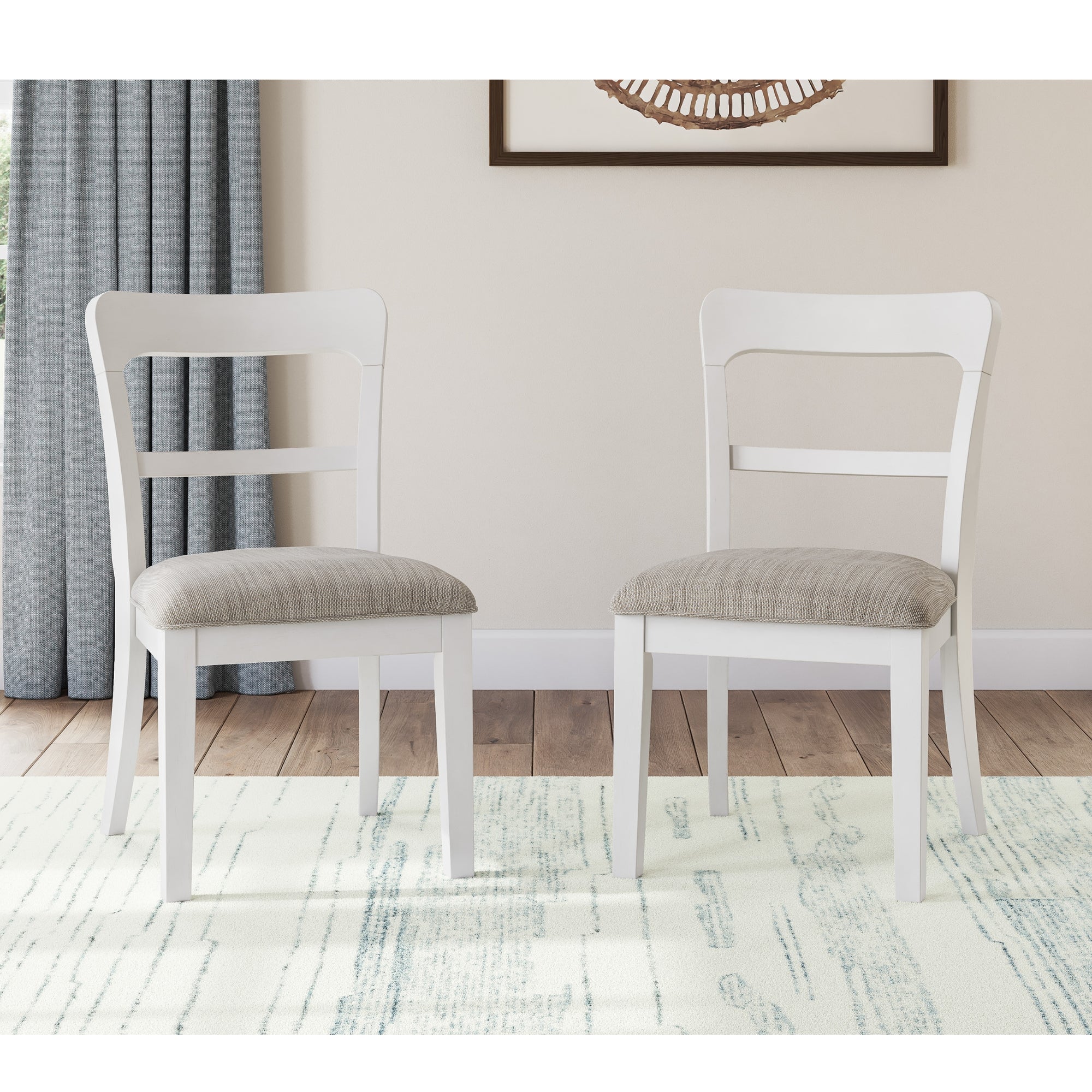 Pair of white Greddinton dining side chairs by Signature Ashley, upholstered dining chairs with sleek modern design.