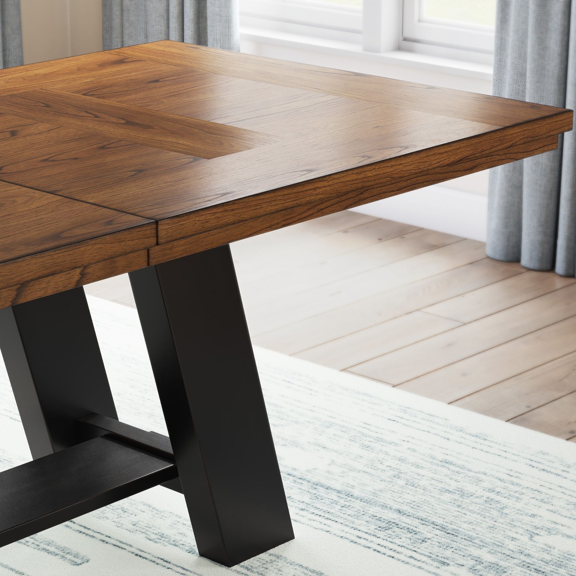 Greddinton Extension Dining Table by Signature Ashley, showcasing a wooden surface with extended leaf for dining room use.