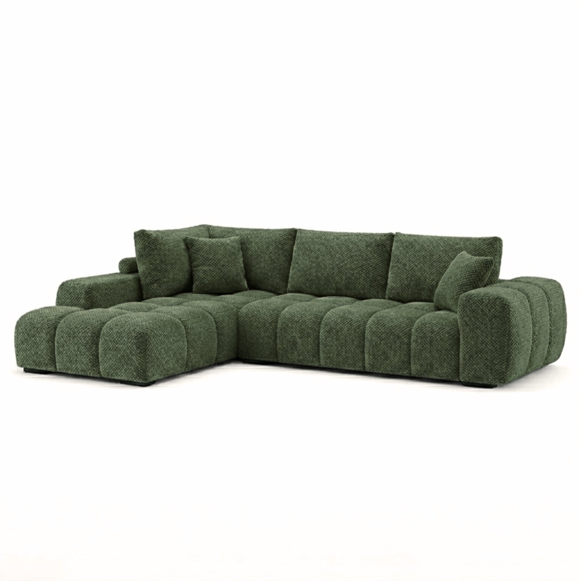 Dark green Brassex sectional sofa by Zara, showcasing plush cushions and modern design in a stylish living room setting.
