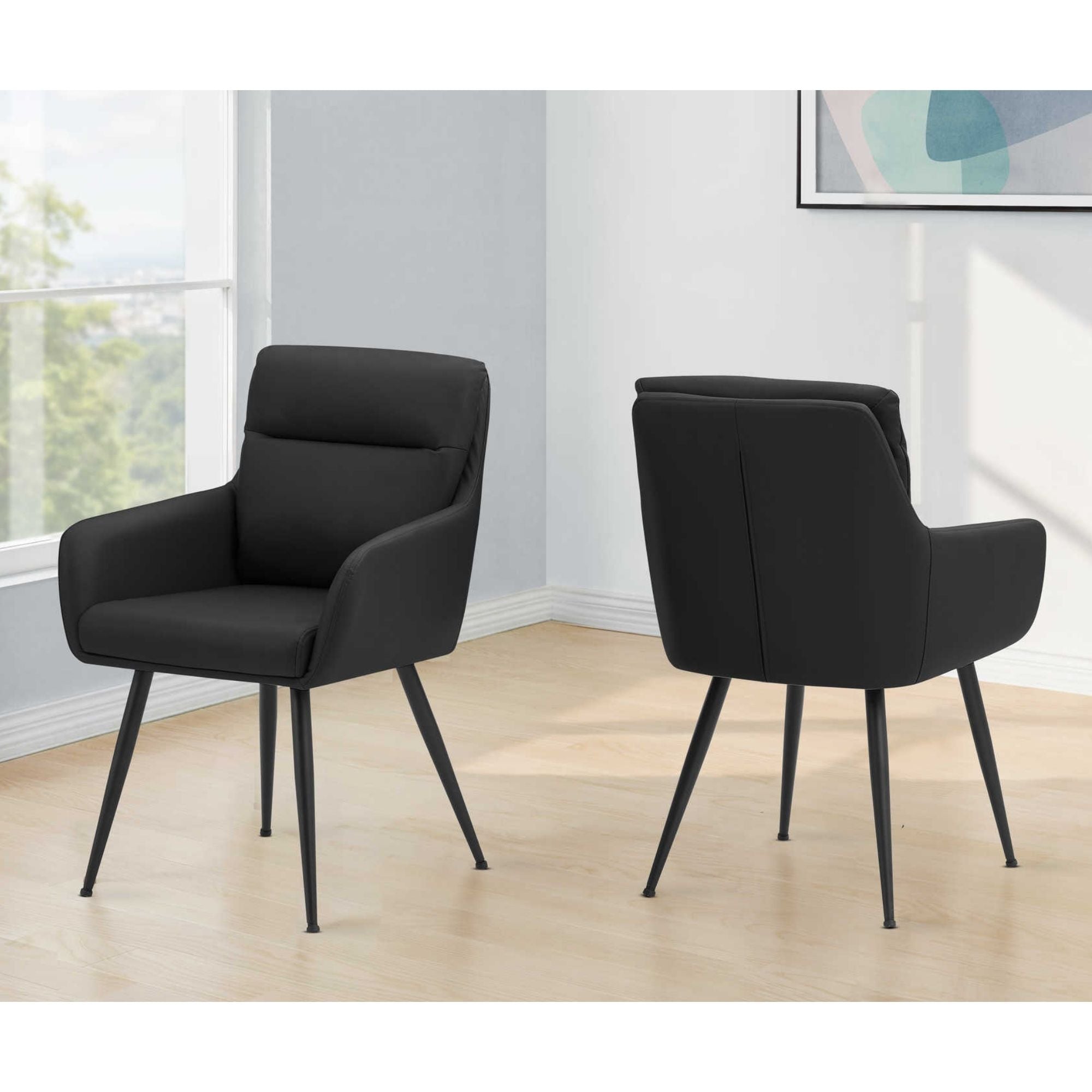 Pair of black leather-look dining chairs by Monarch Specialties, featuring sleek modern design and cushioned seats.