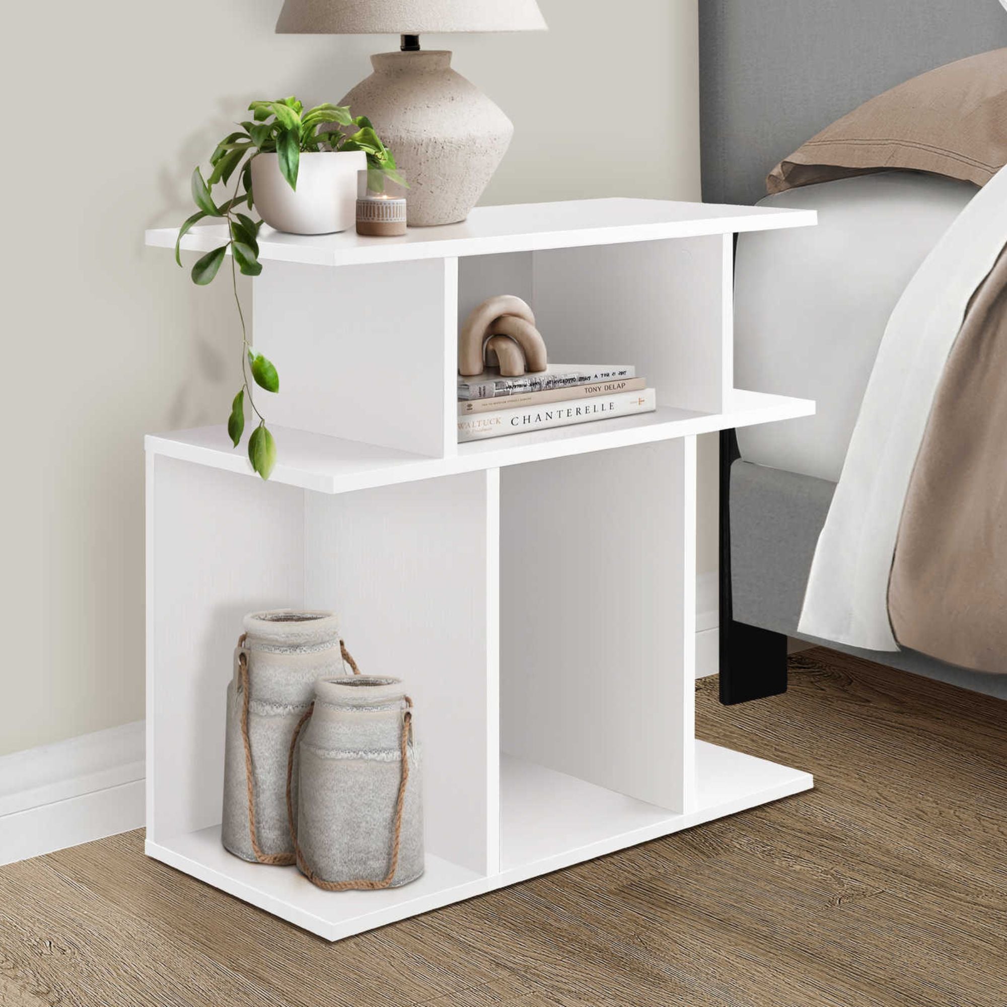 White Monarch Specialties nightstand with open shelves, modern bedroom furniture, showcasing clean design and storage space.
