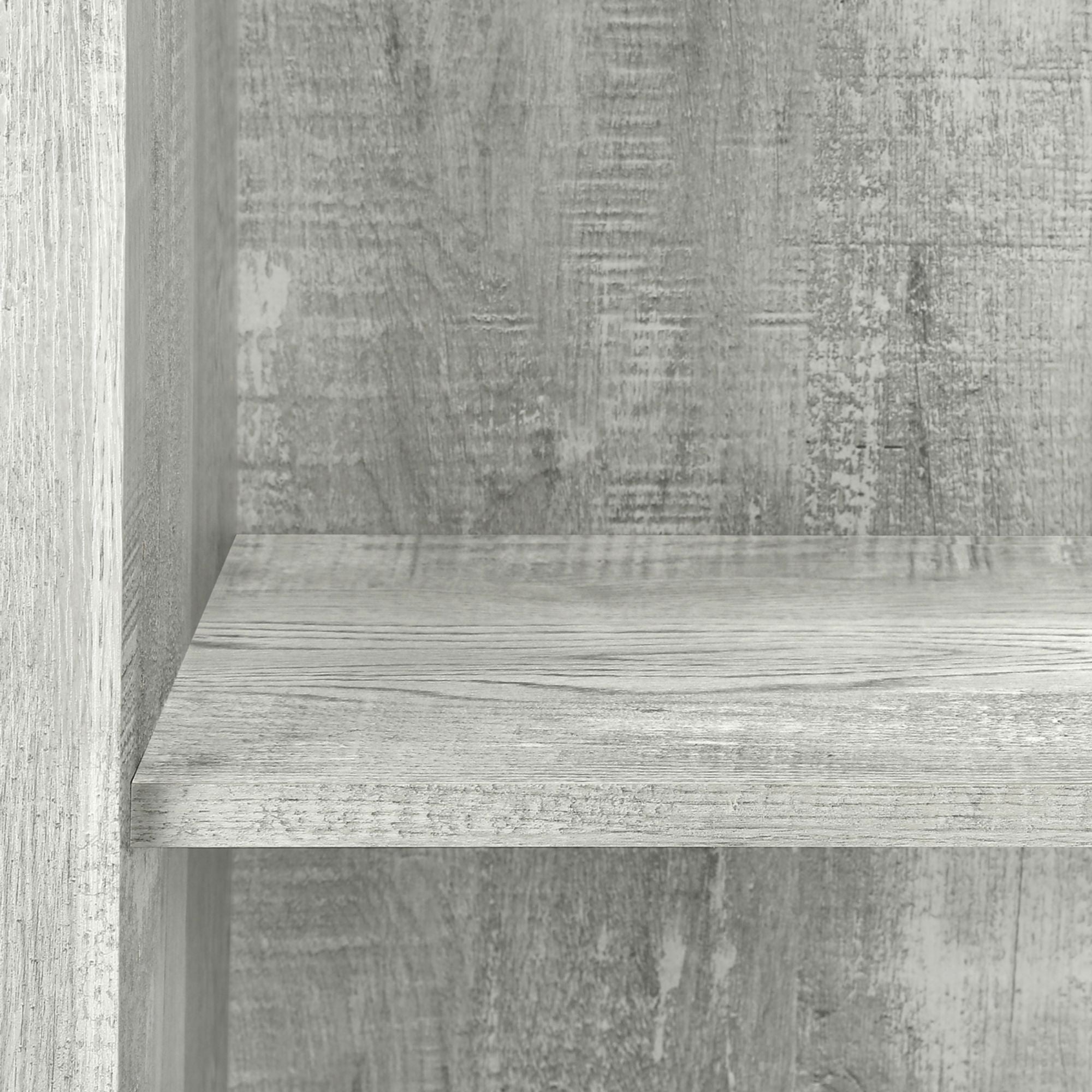 Grey reclaimed wood-look Shelvara 48-inch bookcase by Monarch Specialties, showcasing multiple shelves and open storage.