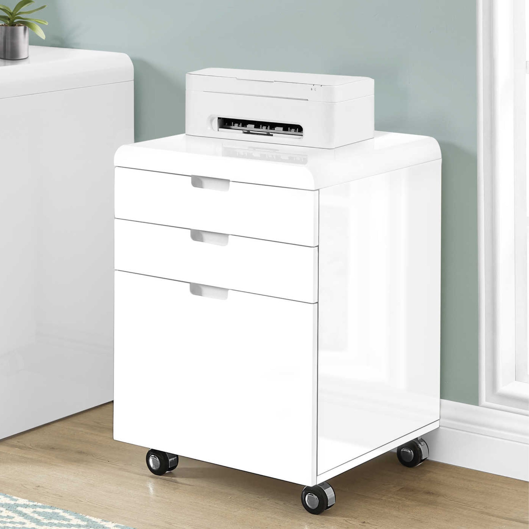Monarch Specialties Studiora filing cabinet with multiple drawers and modern black finish, ideal for office or home storage.