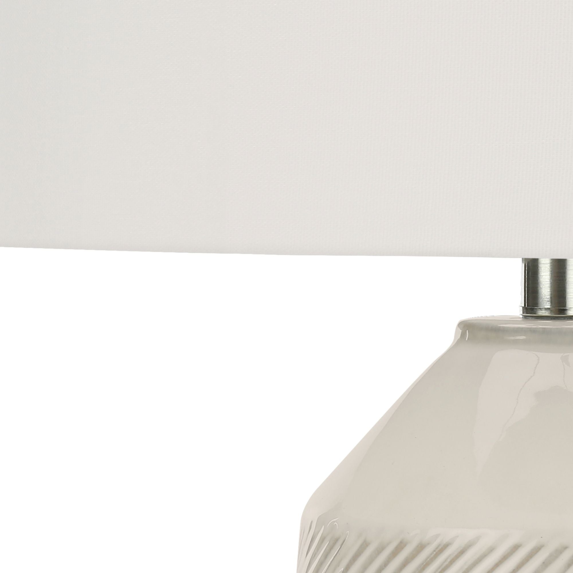 Cream ceramic table lamp, 33 inches tall, with a sleek design and round base, by Monarch Specialties.