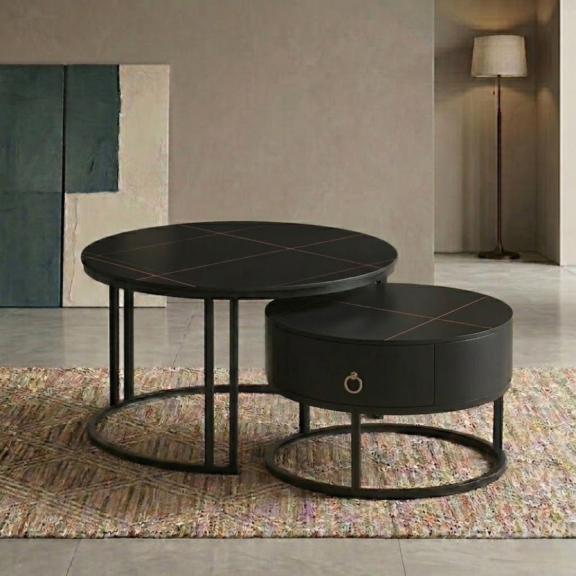 Black Marquina stone top coffee table set by IFF, modern design with sleek surfaces and sturdy legs.
