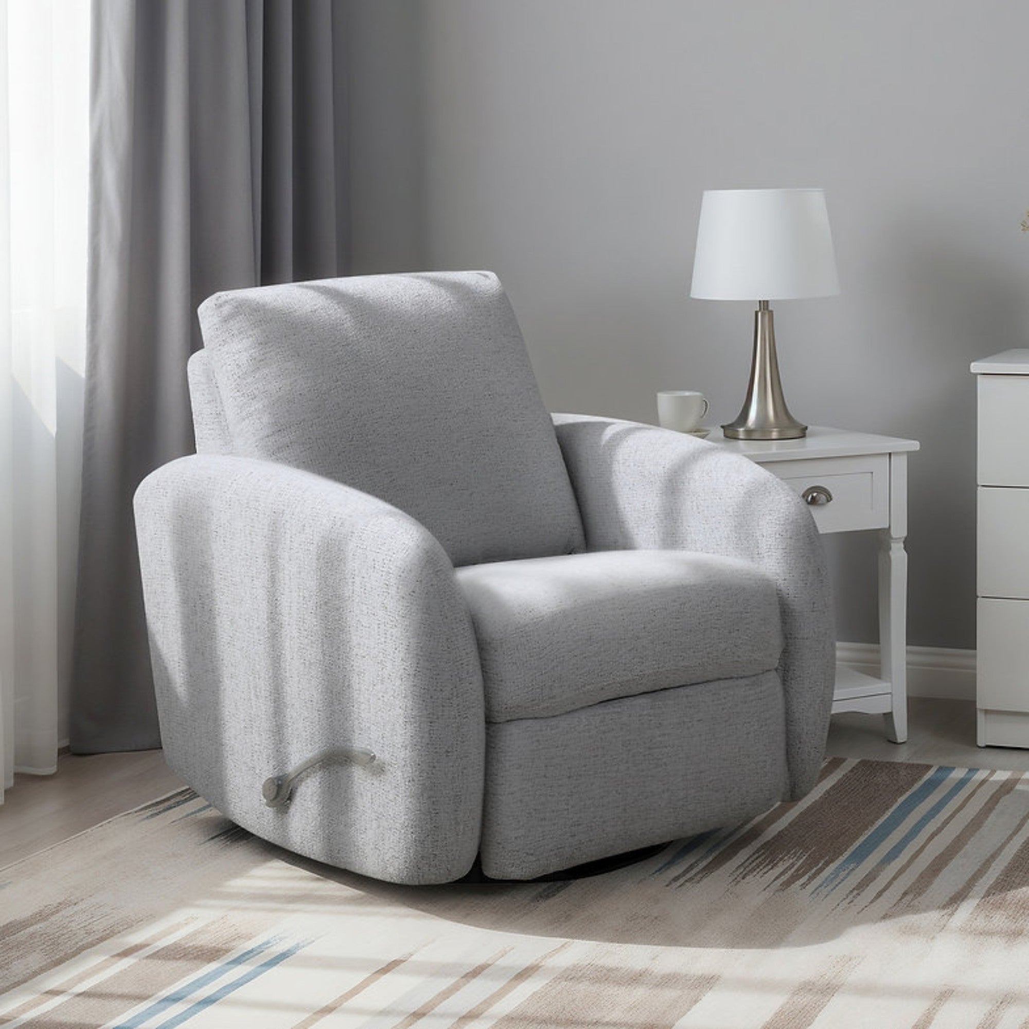 Light grey IFF Bentley Comfort Recliner in reclining chair style with cushioned armrests and plush upholstery.