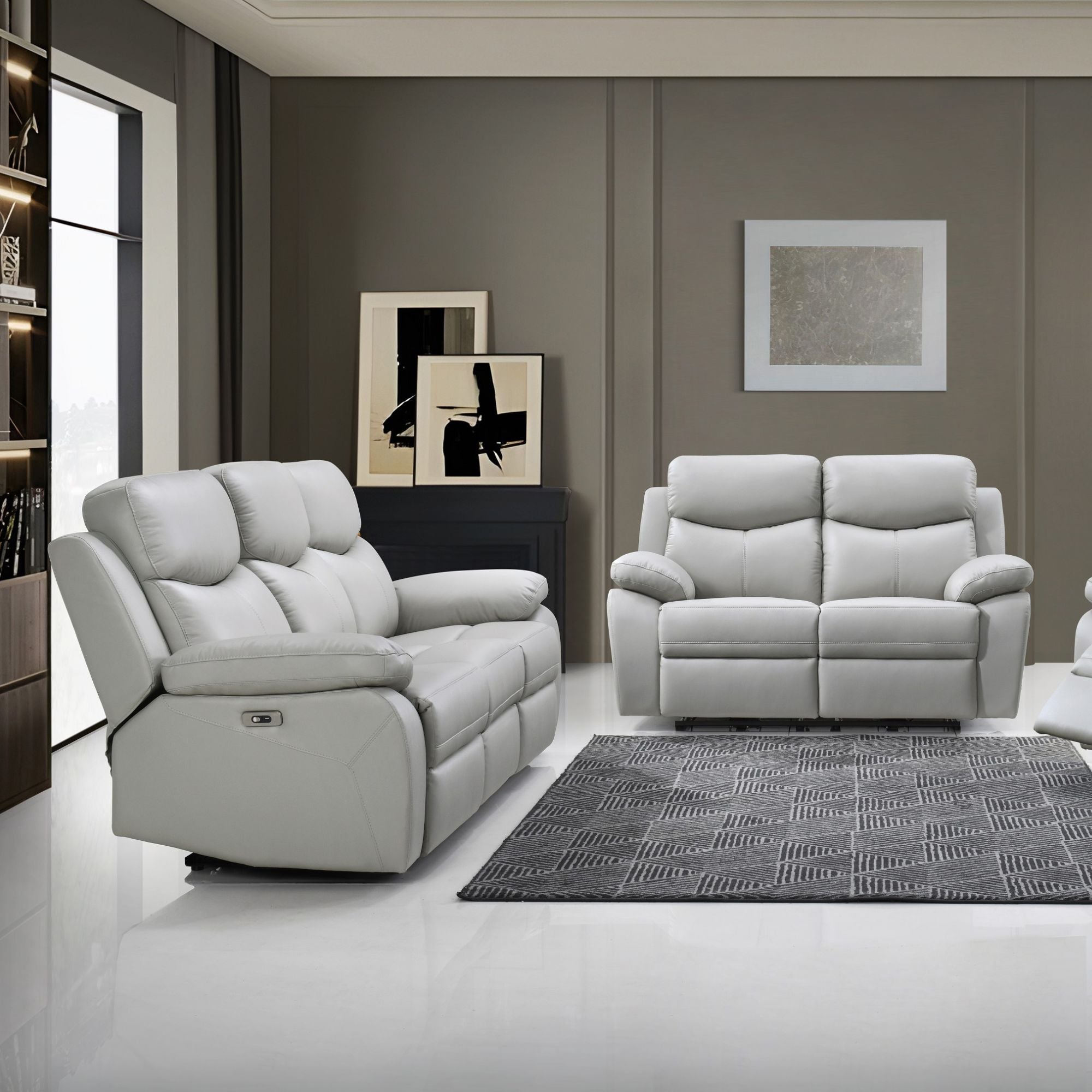 Light grey Axton Luxe leather power recliner sofa set by IFF, featuring plush cushions and modern design, perfect for living rooms.