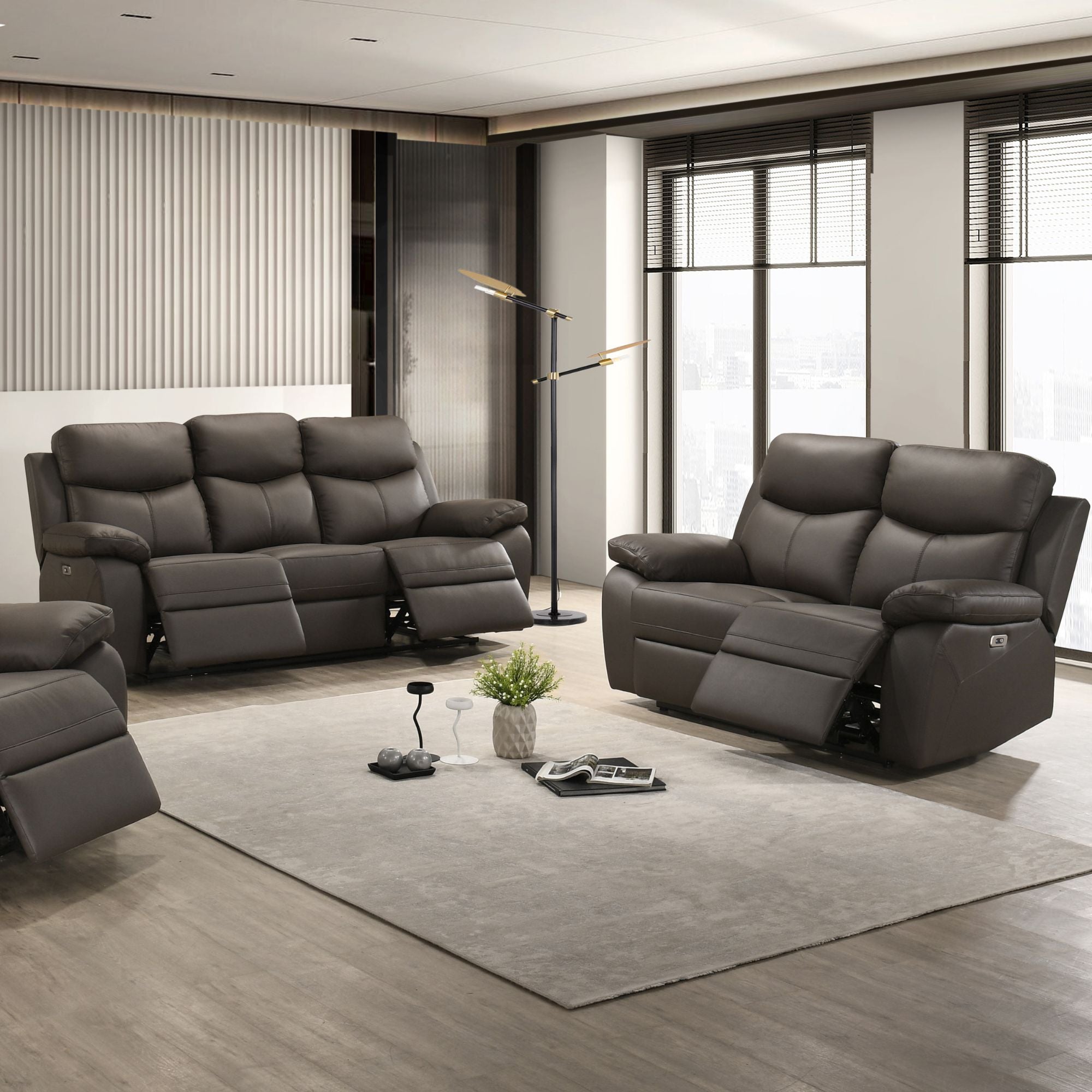 Iff Axton Luxe leather recliner sofa set in rich chocolate with plush cushions and reclining features, shown in a modern living room setting.