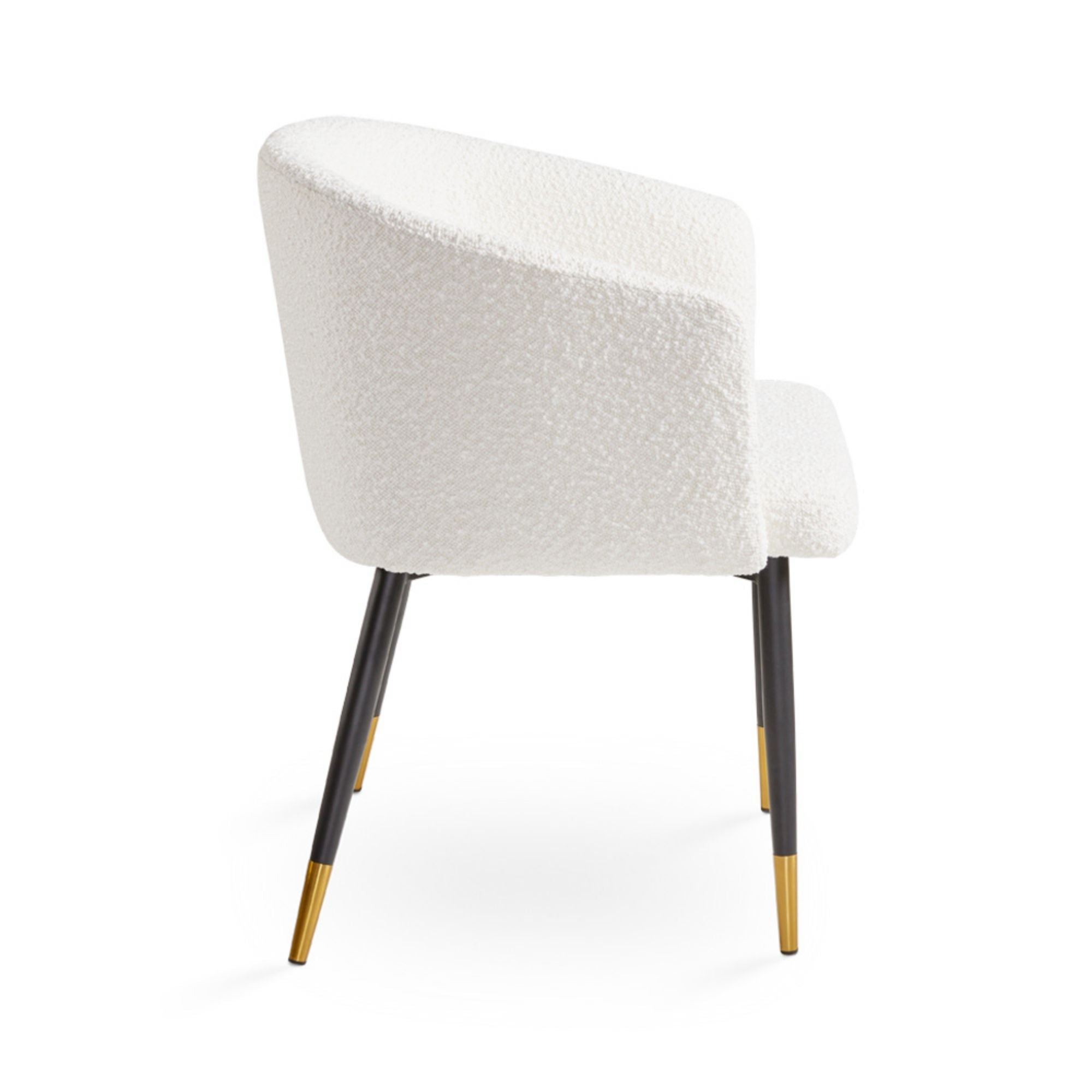 White Jordan dining chair by Xcella featuring plush boucle upholstery and sleek modern design for stylish dining spaces.