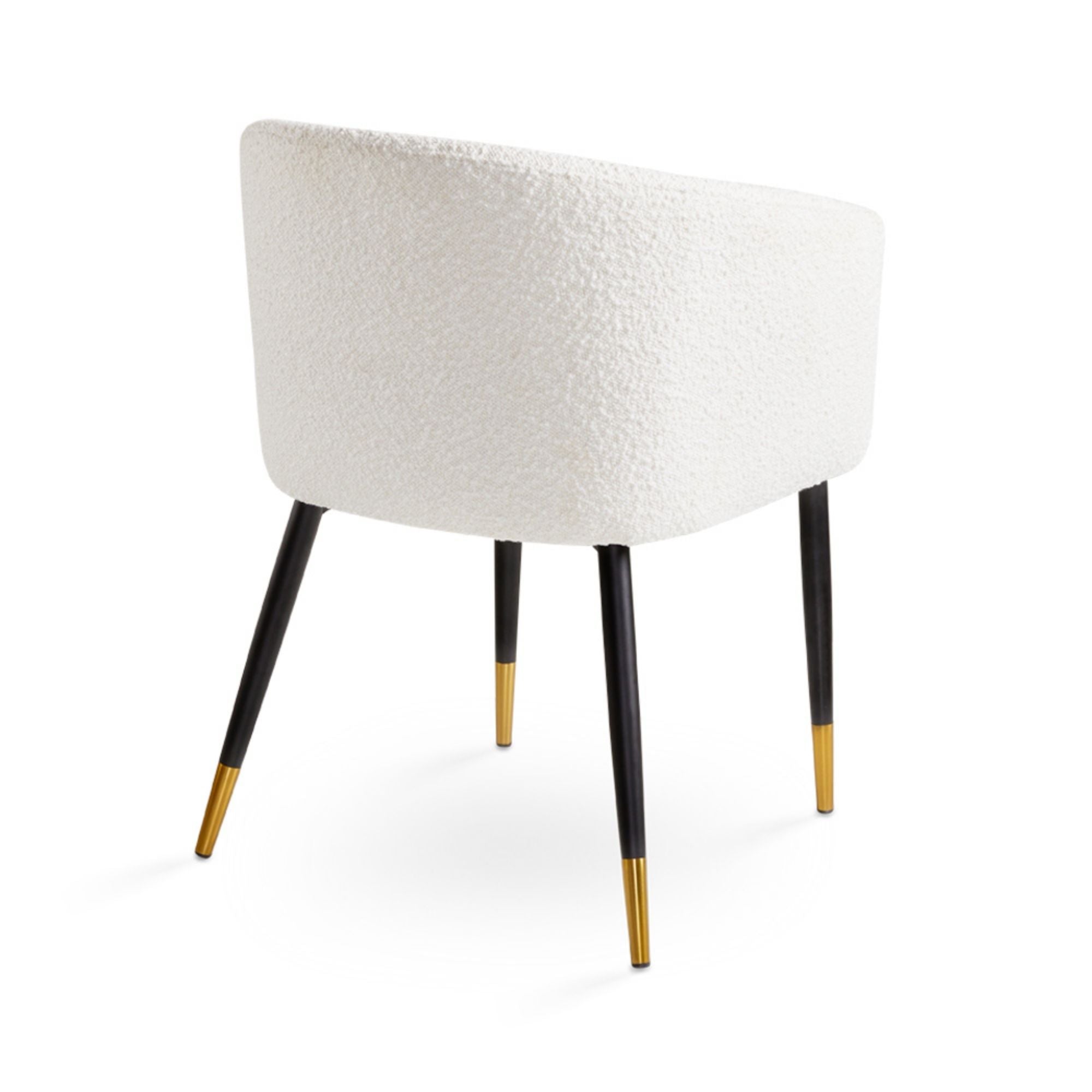 White Jordan dining chair by Xcella with a boucle fabric upholstery, showcasing its modern design and comfortable seating.