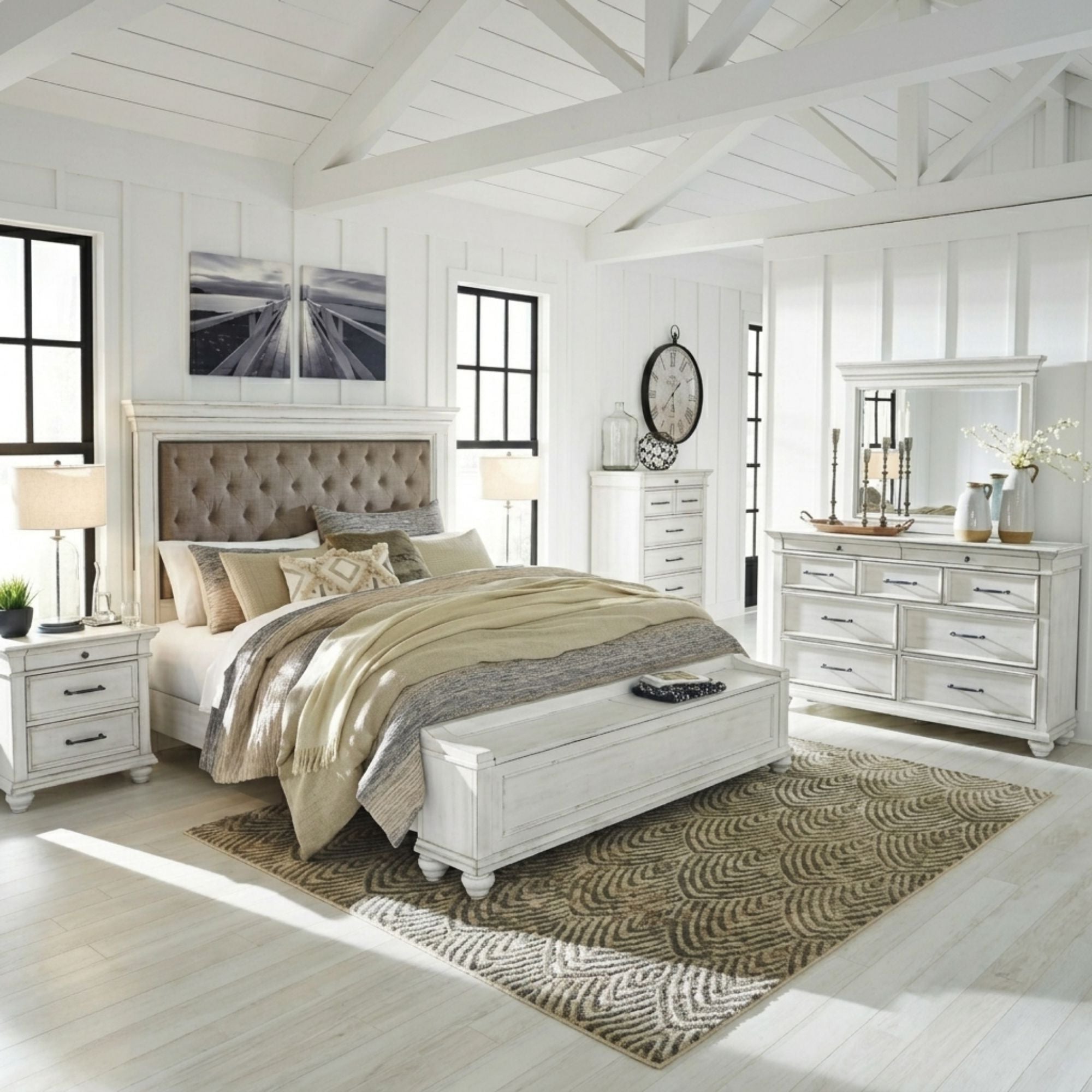 White Kanwyn upholstered panel bedroom set with storage bench by Signature Ashley, includes bed frame and matching bedroom furniture.