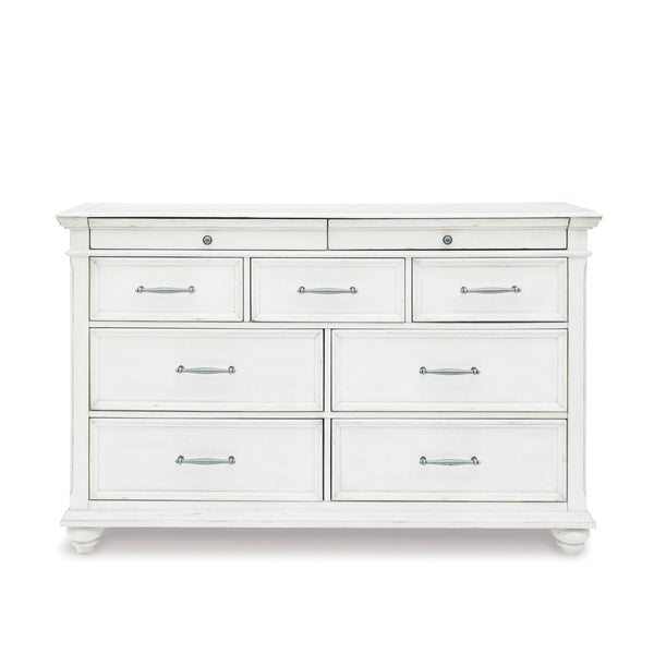 White Kanwyn dresser from Signature Ashley with sleek drawers, part of the modern bedroom furniture set.