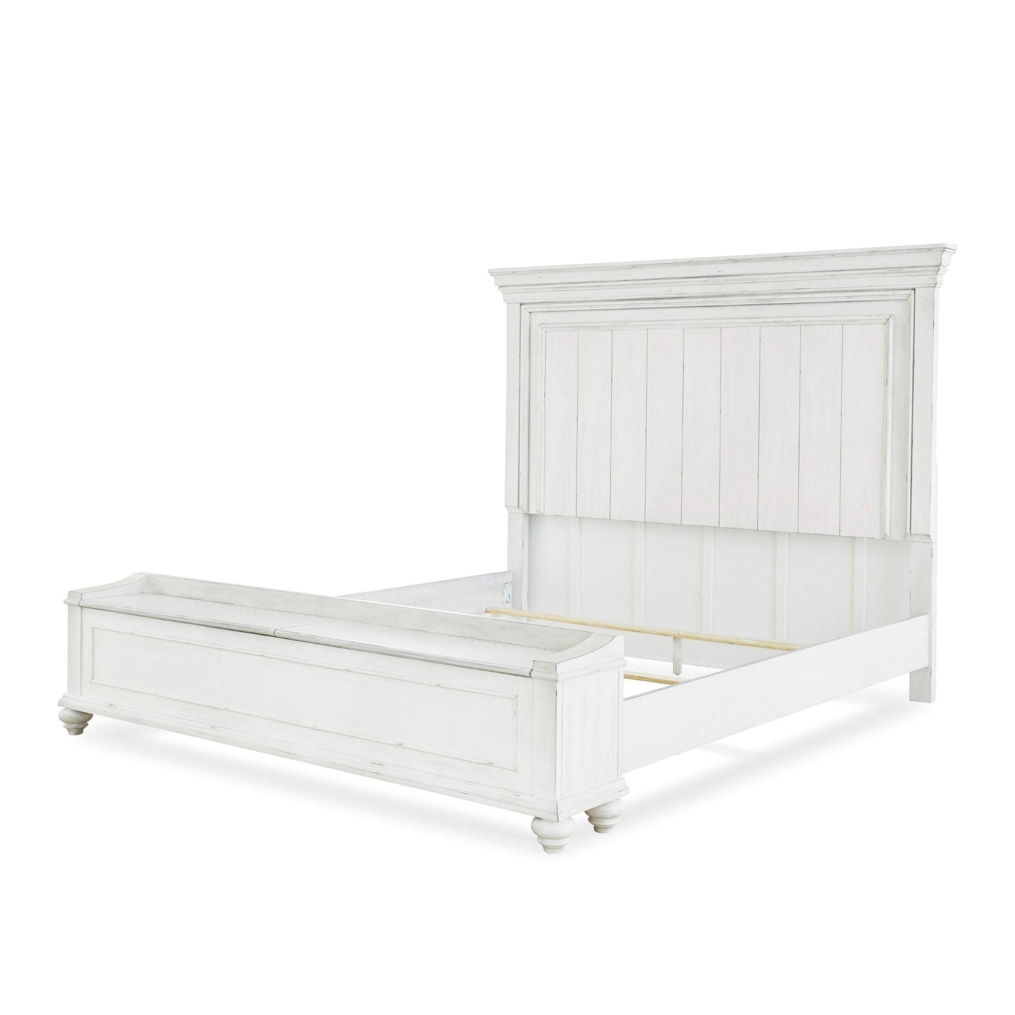 White Kanwyn Panel Bed by Signature Ashley, showcasing a classic bedroom setup with a sturdy wooden frame and clean design.