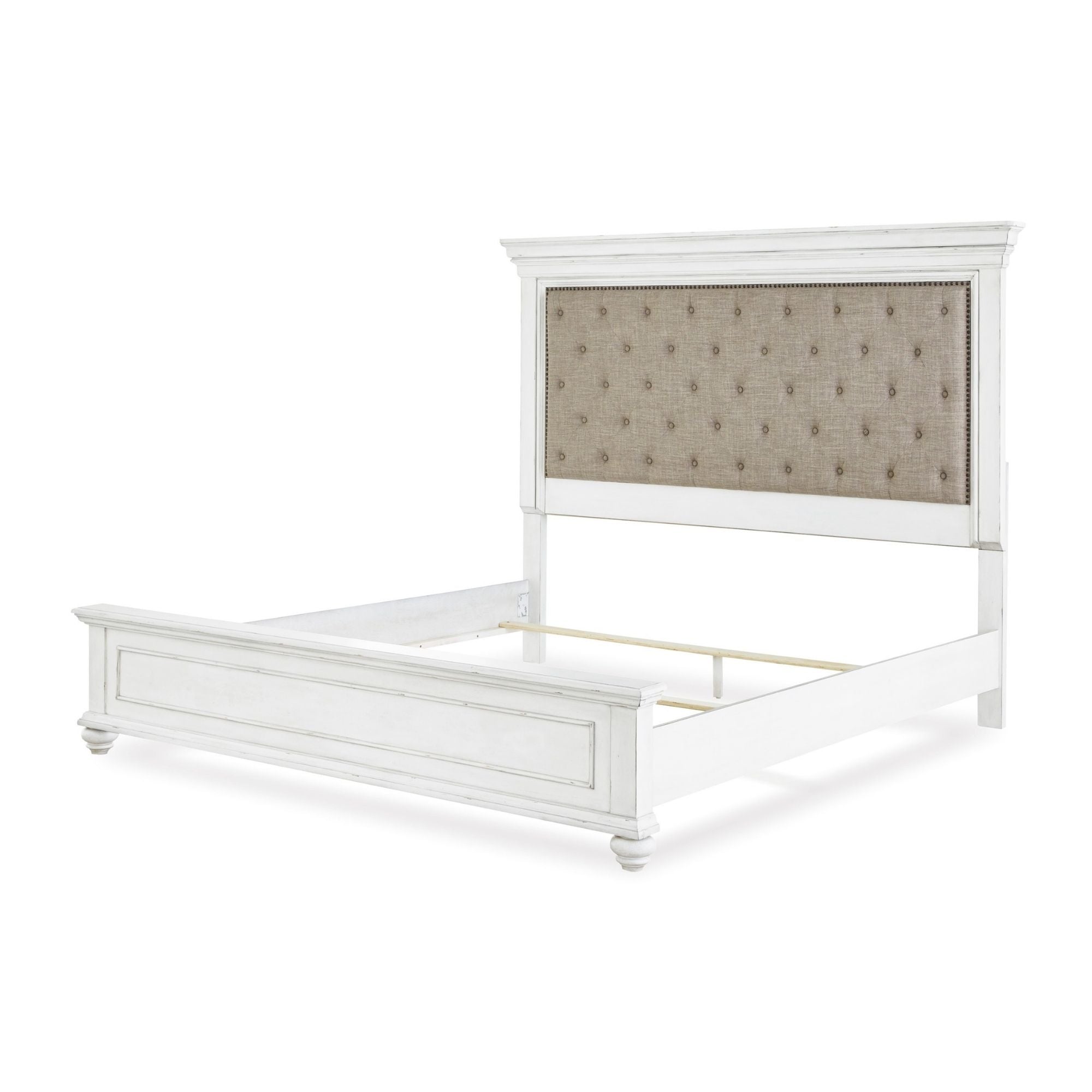 White upholstered panel bed from the Kanwyn collection by Signature Ashley, featuring a sleek and modern bedroom design.