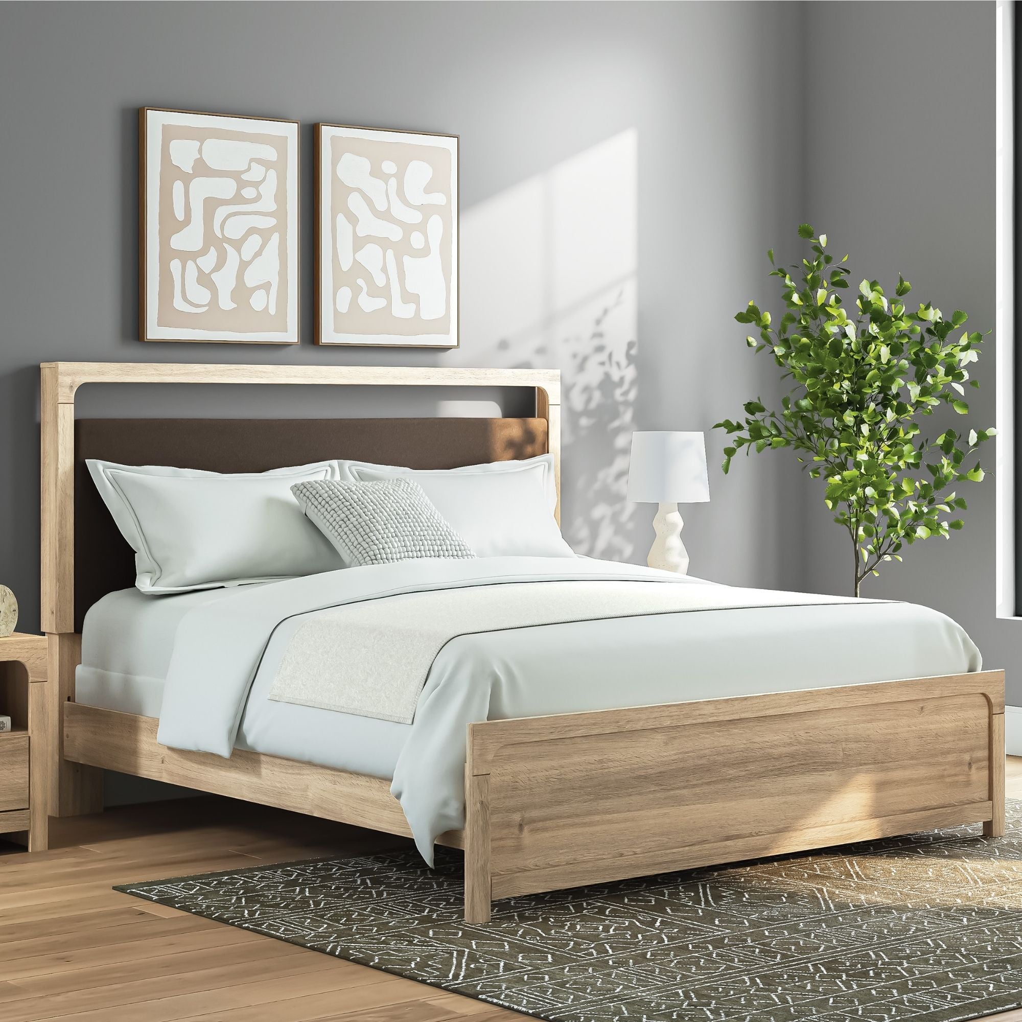 Tan upholstered platform bed from the Kinlanni collection by Signature Ashley, featuring a padded headboard and sleek frame.