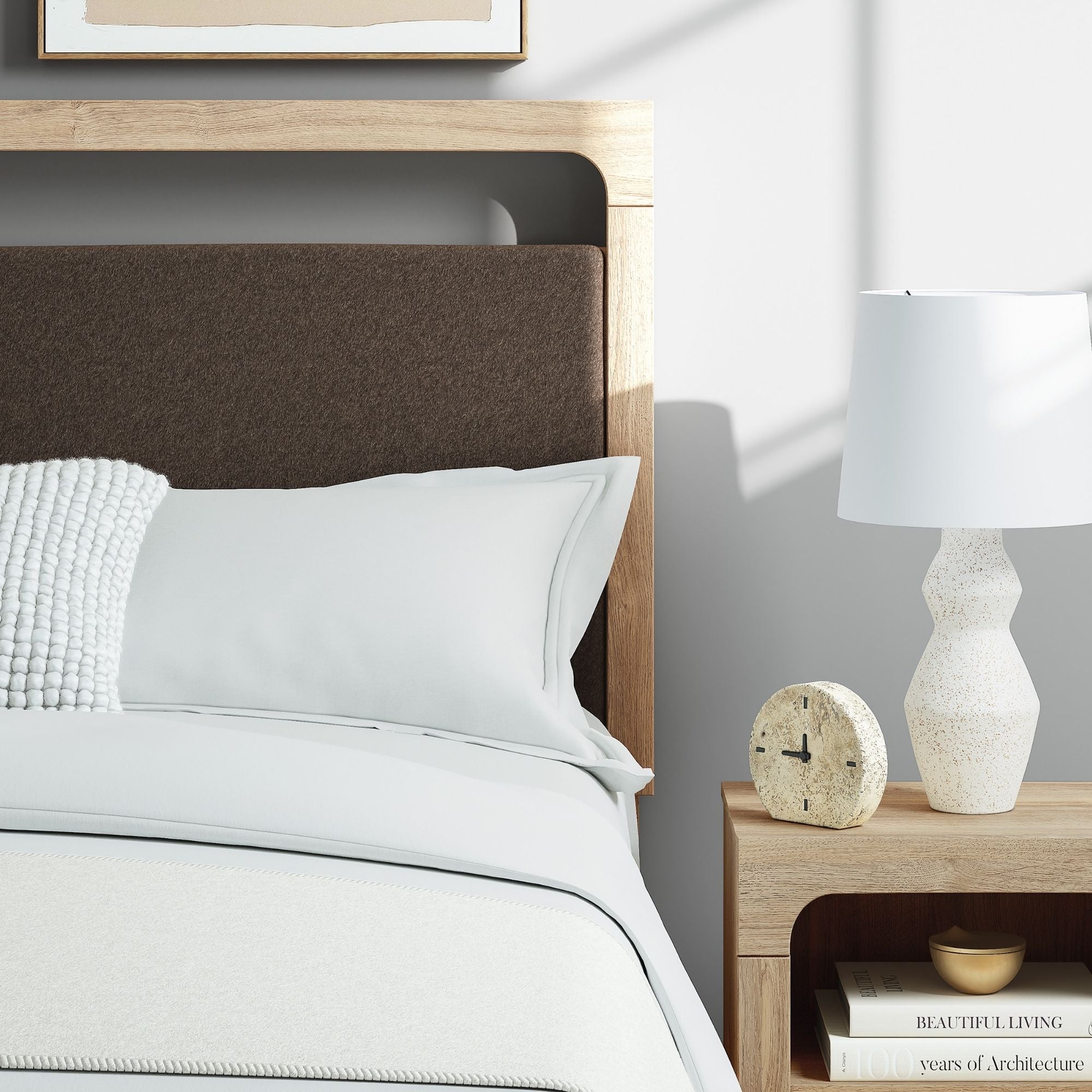 Tan upholstered platform bed from the Kinlanni collection by Signature Ashley, featuring a padded headboard and sleek design.