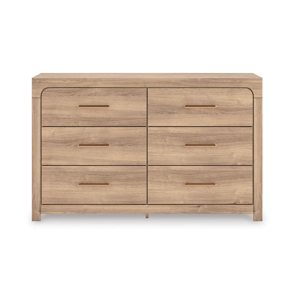 Six-drawer tan dresser from the Kinlanni bedroom set by Signature Ashley, featuring sleek design and ample storage space.