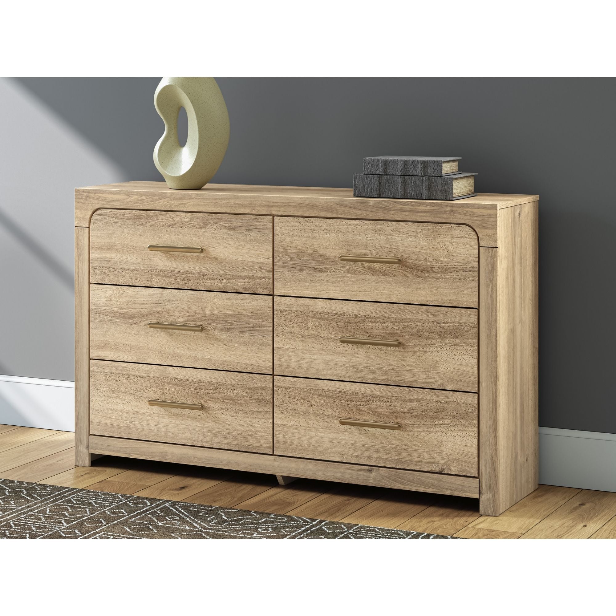 Six-drawer tan dresser from the Kinlanni bedroom set by Signature Ashley, showcasing sleek wood finish and modern design.
