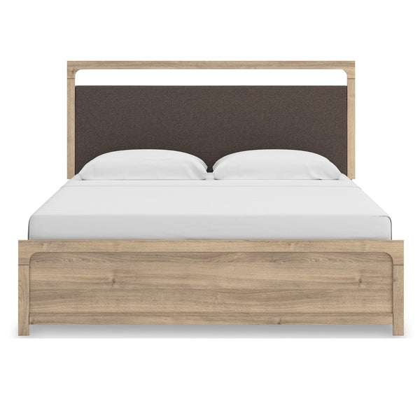 Tan Kinlanni upholstered platform bed by Signature Ashley, showcasing a stylish bedroom setup with plush headboard and modern design.