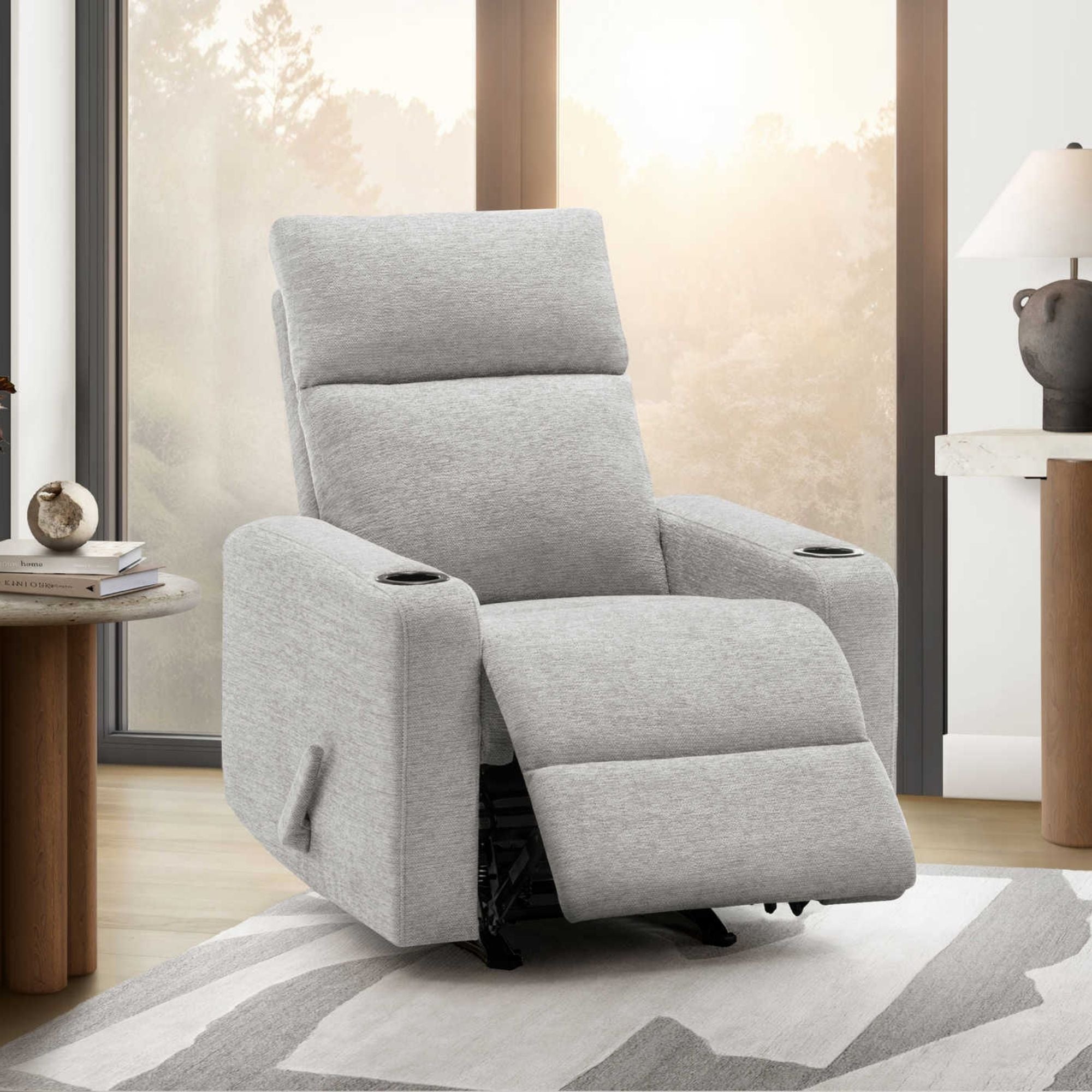 Light grey Monarch Specialties Arden rocker reclining chair with built-in cupholders and padded armrests.