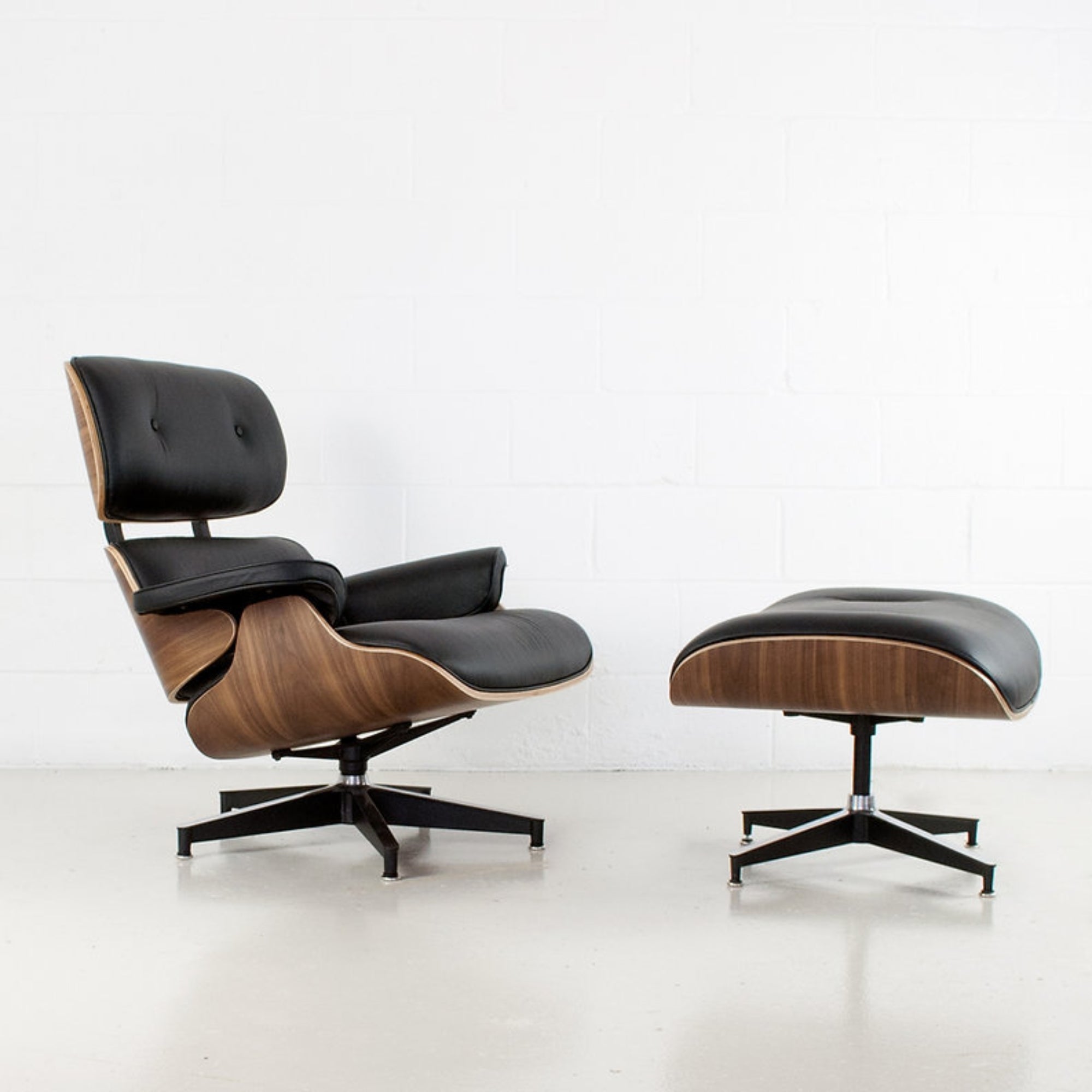 Elite Living Charles top grain leather swivel lounge chair with matching ottoman, featuring a sleek, modern accent chair design.