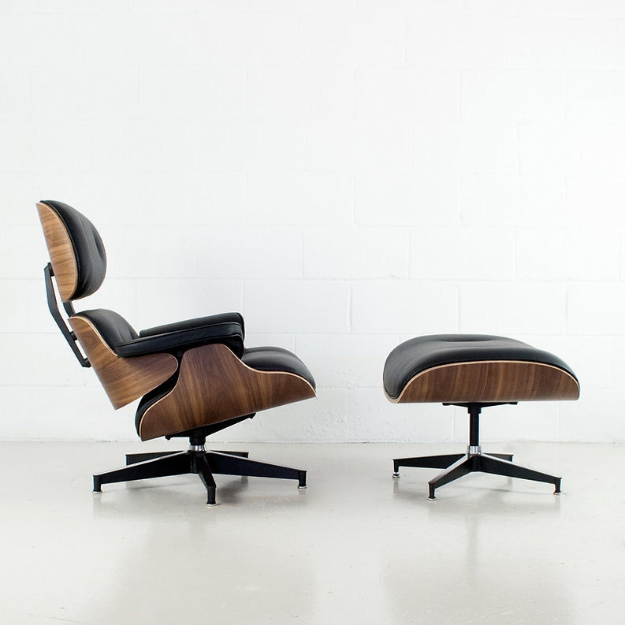 Elite Living Charles top grain leather swivel lounge chair with matching ottoman, featuring a modern accent chair design.