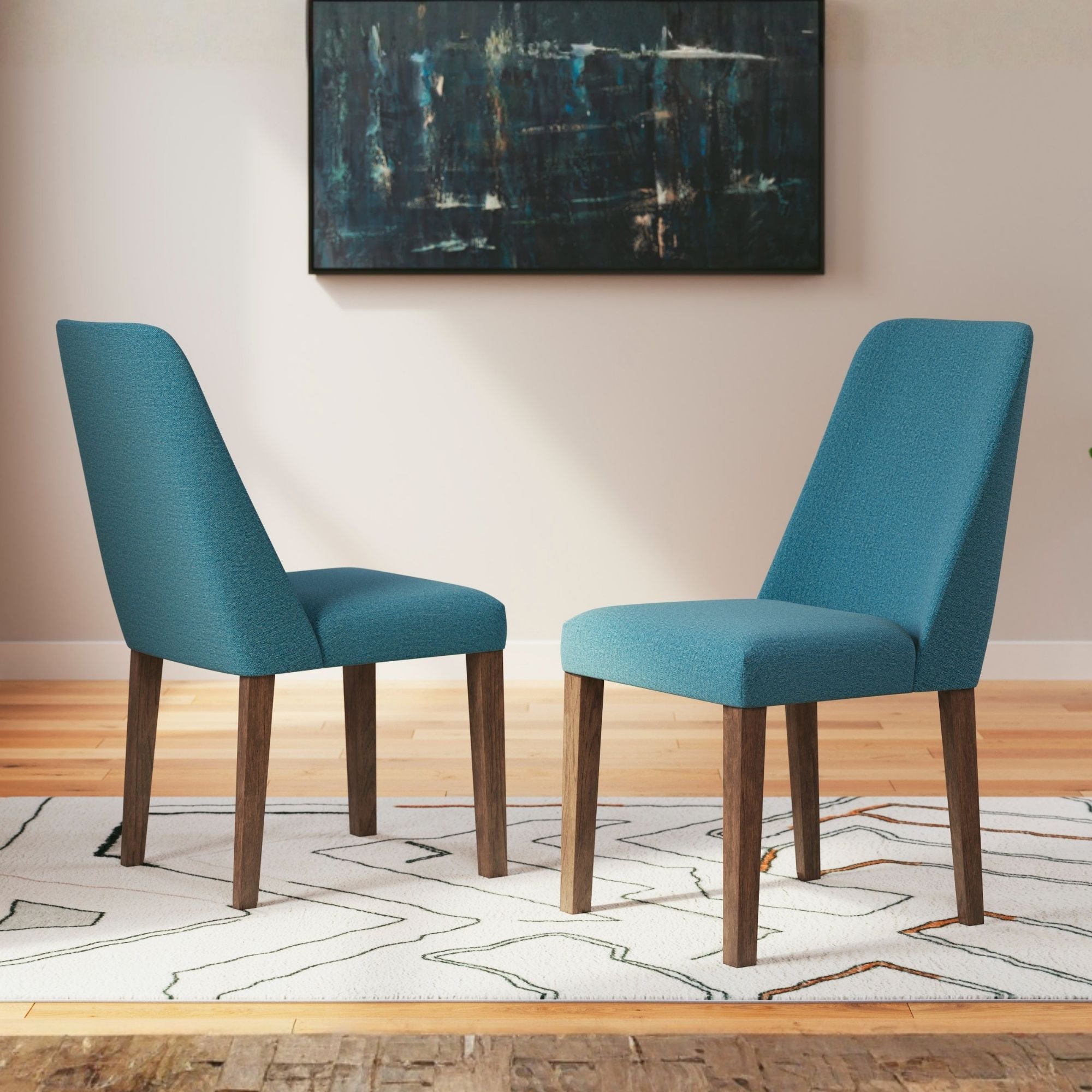 Set of two blue Lyncott dining UPH side chairs by Signature Ashley, showcasing sleek upholstery and modern dining room style.