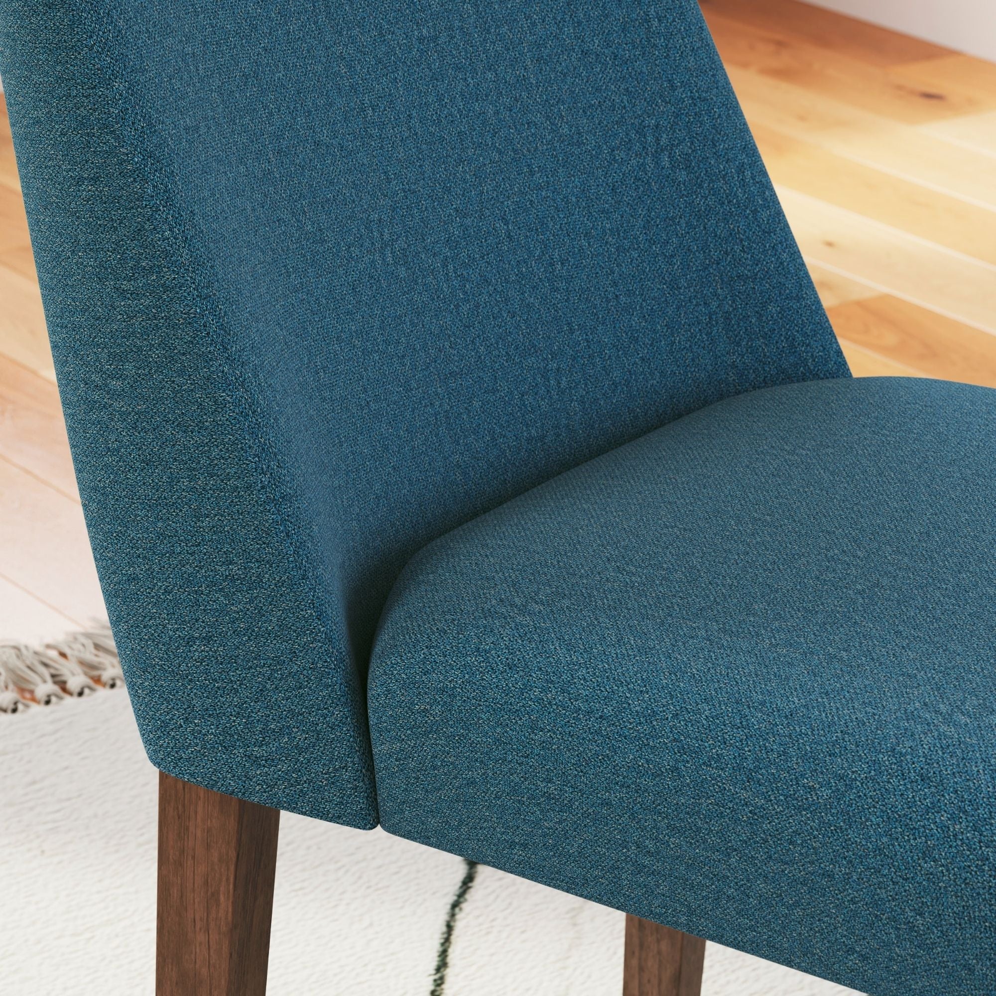 Blue Lyncott Collection dining room set with upholstered side chairs by Signature Ashley, featuring a stylish and modern design.