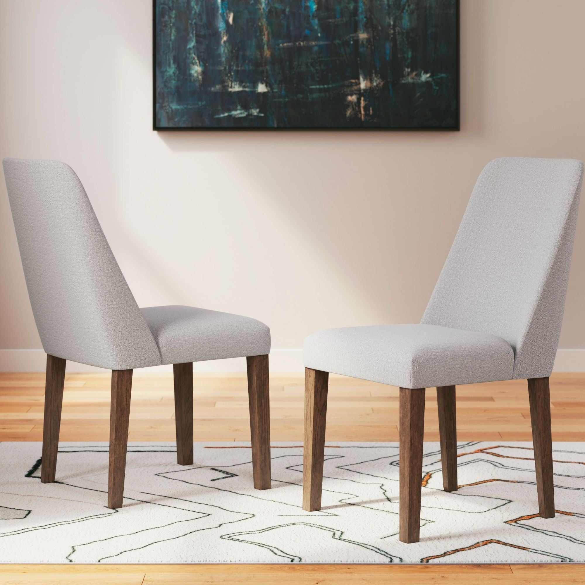 Set of two Lyncott dining UPH side chairs in light grey with wooden legs, designed for comfortable dining room seating.