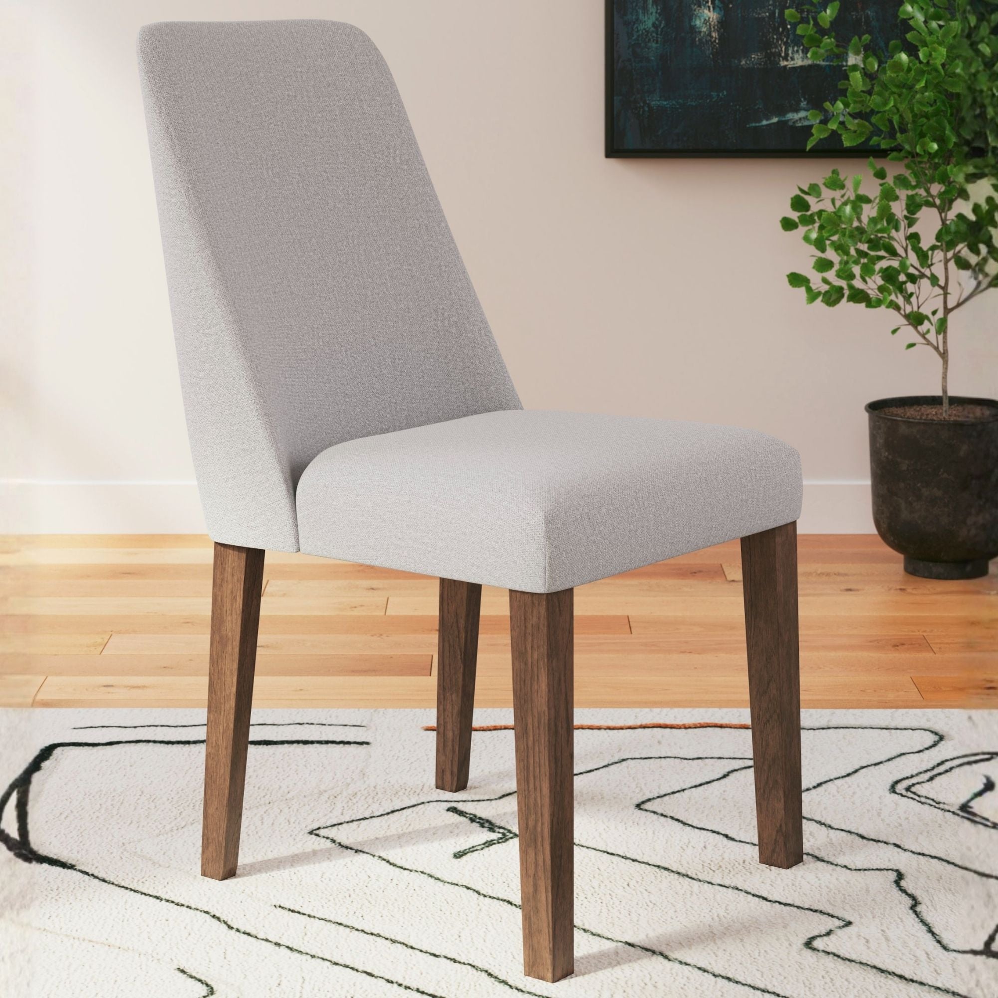 Set of two Ashley Lyncott dining UPH side chairs in light grey with wooden legs, stylish and comfortable for modern dining rooms.