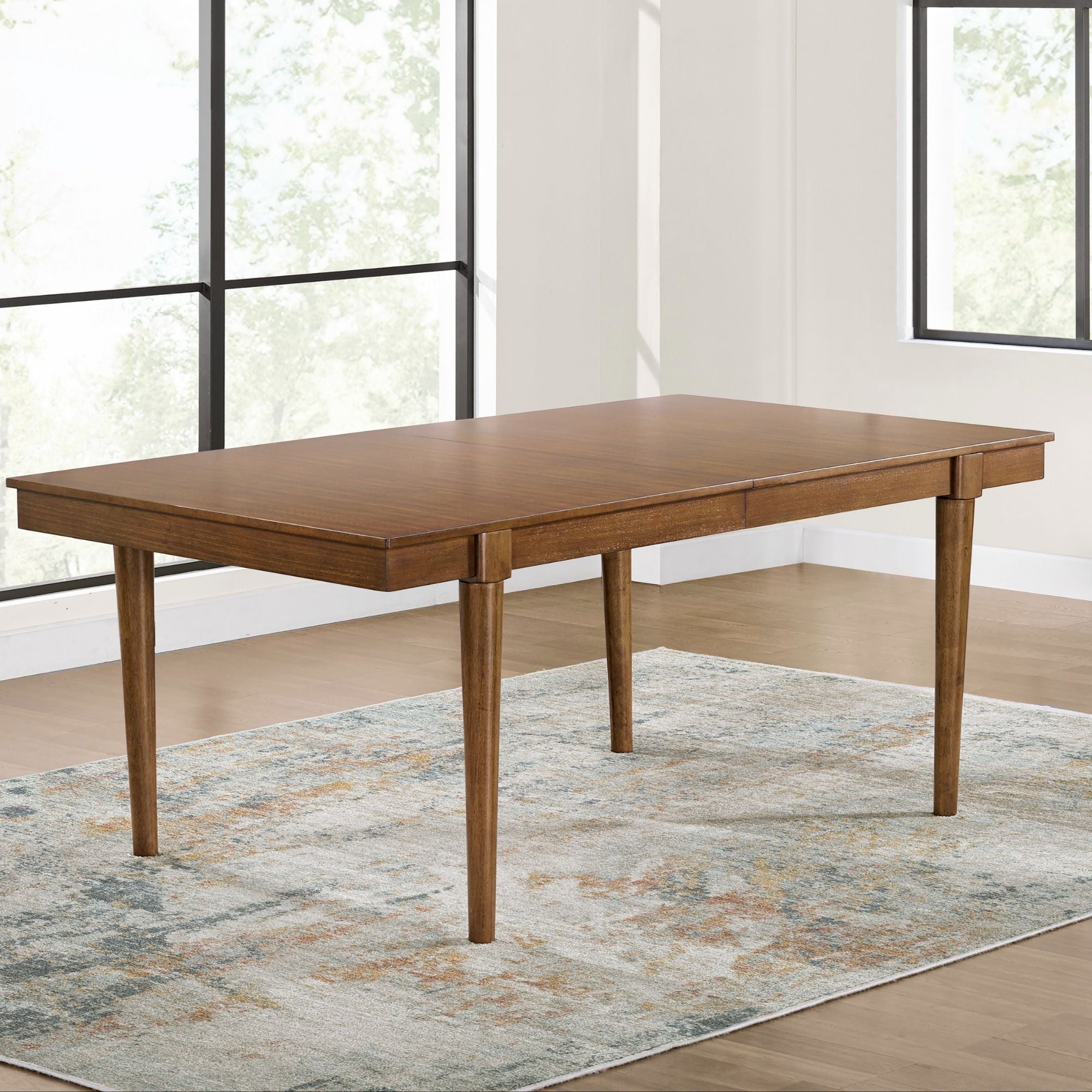 Lyncott Ext Dining Room Table by Signature Ashley showcasing a wooden extension table with a polished finish and sturdy legs.