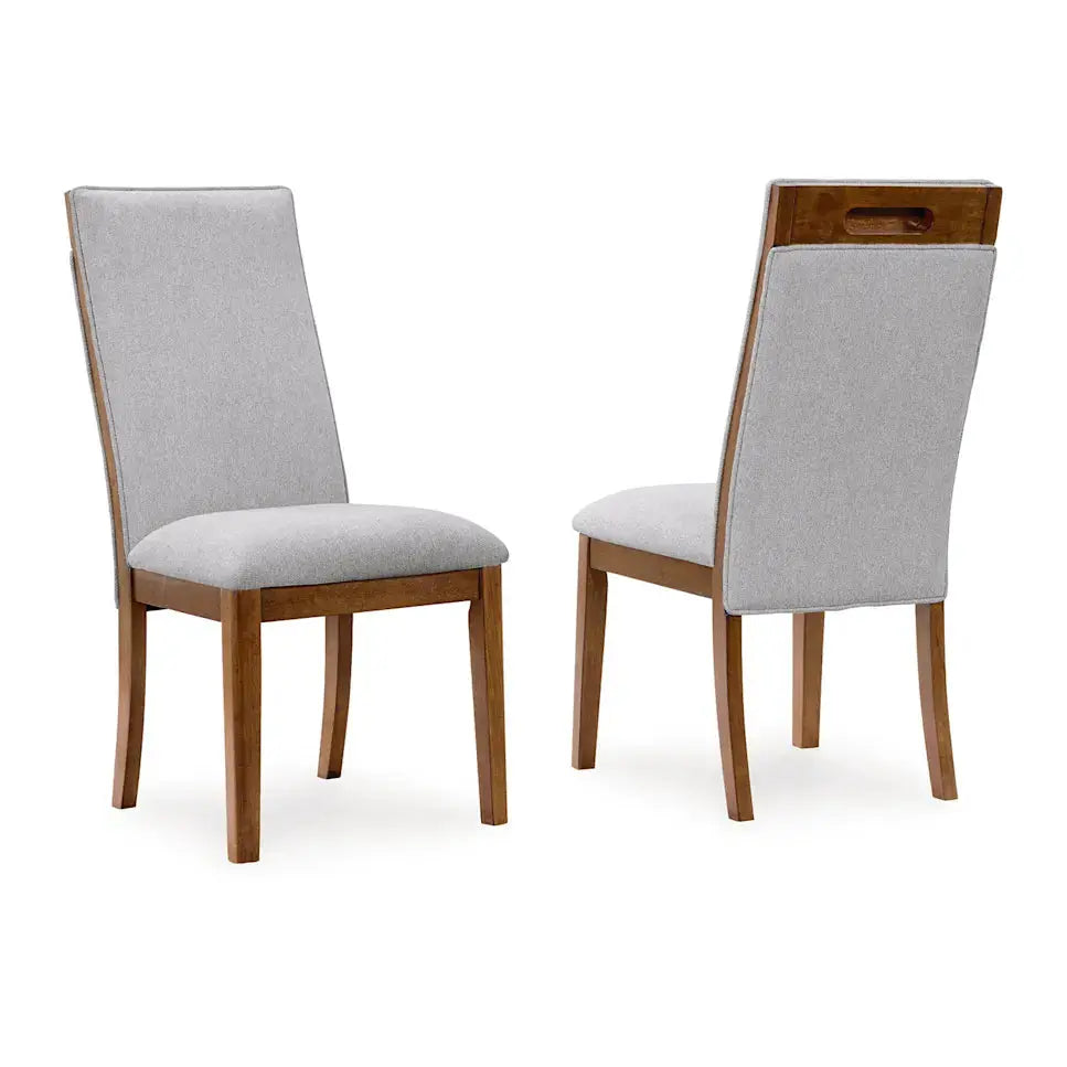 Lyncott grey and brown dining room set by Signature Ashley with a table and matching chairs in a modern dining space.