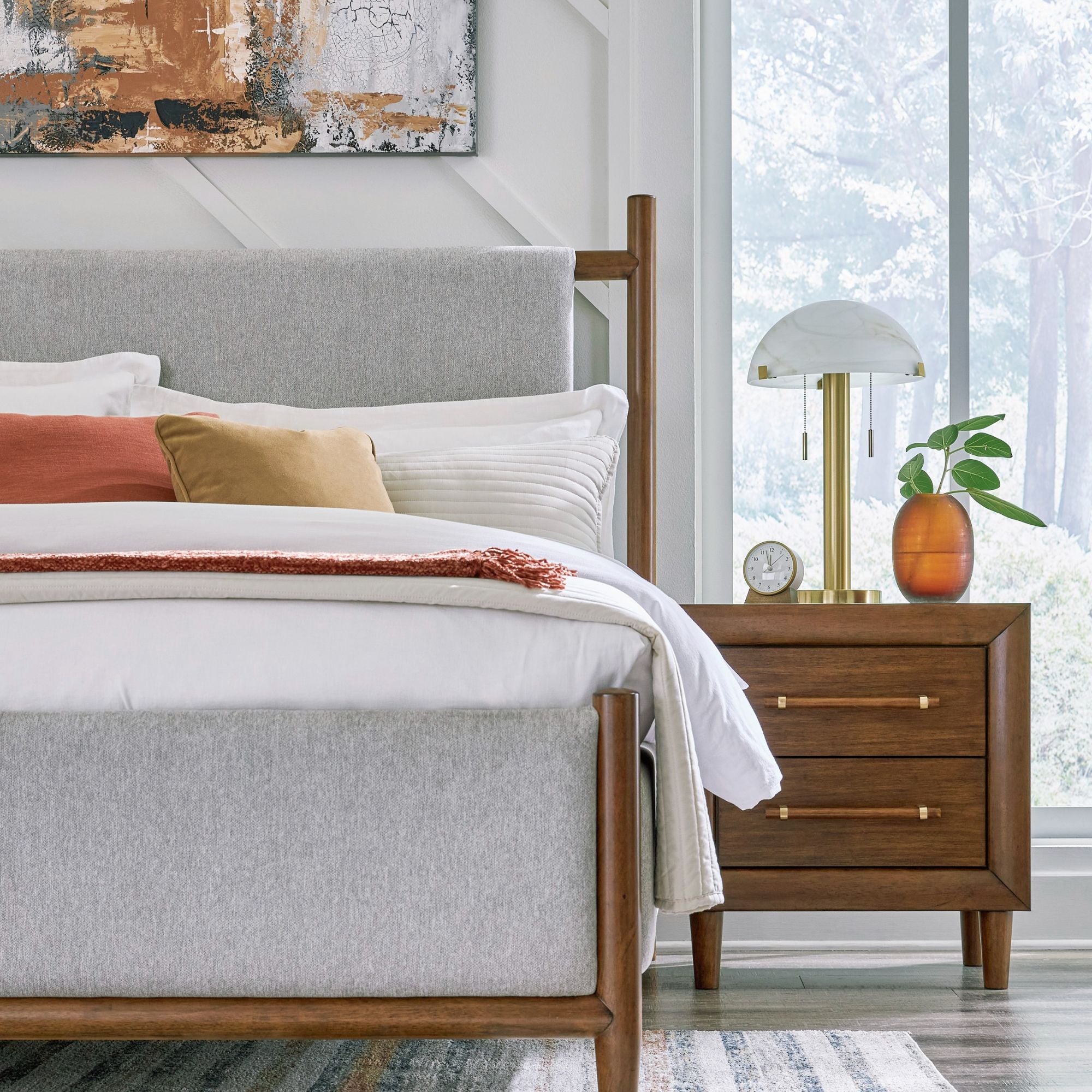 Lyncott upholstered panel bedroom set by Signature Design Ashley featuring a bed with a padded headboard and matching bedroom furniture.